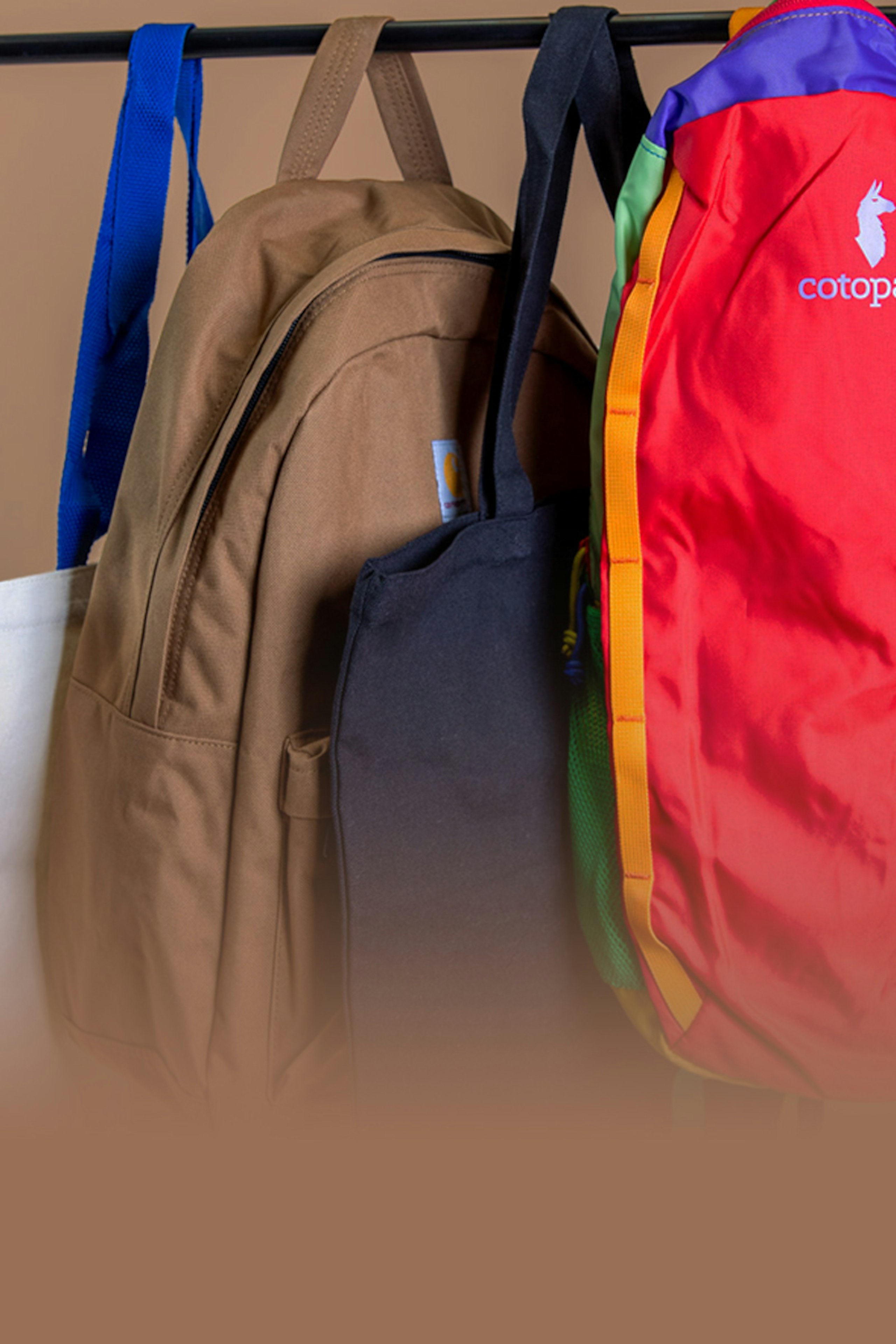 four different type of bags hanging