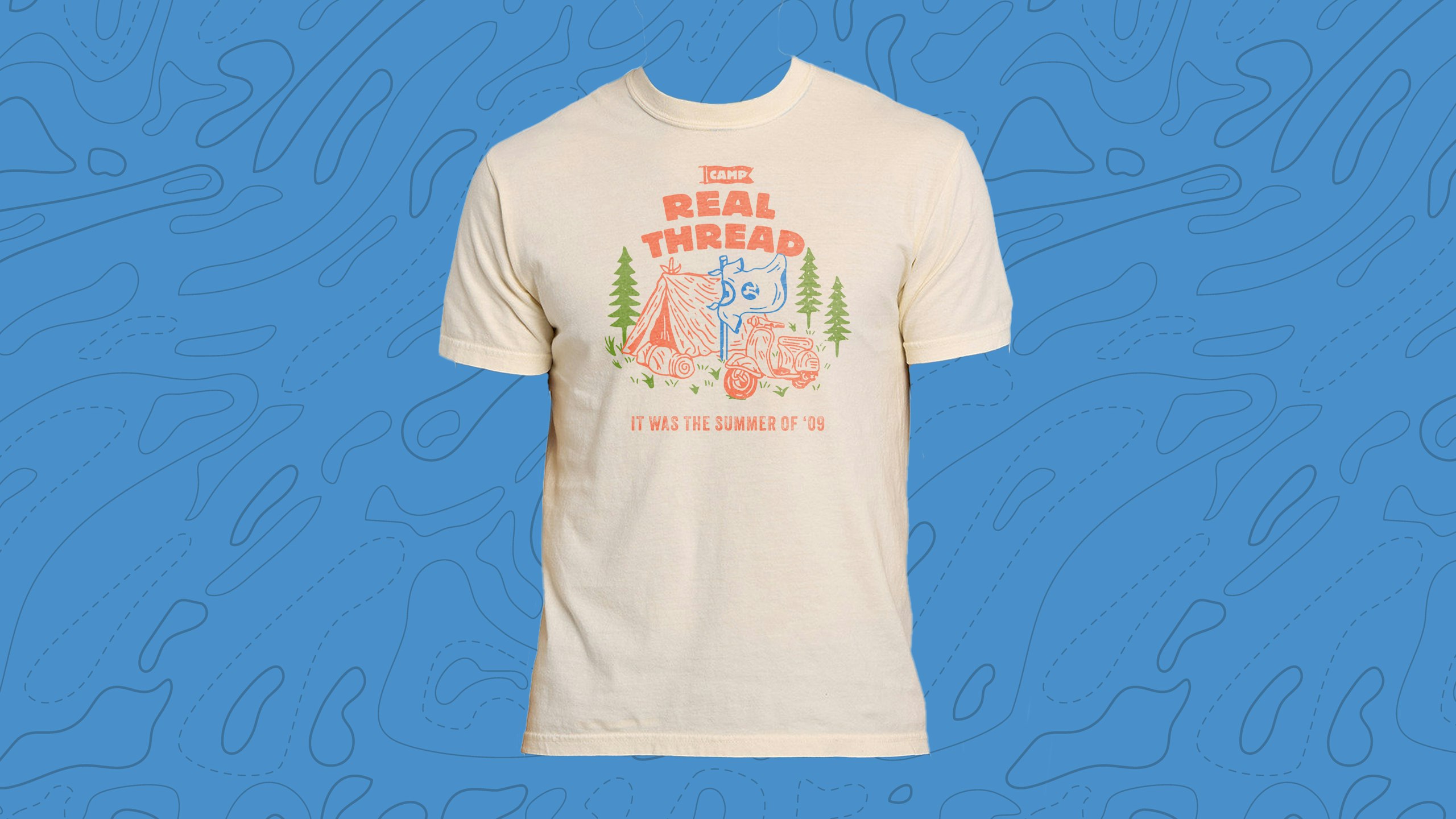 real thread garement-dyed camp tee on a topographic texture background