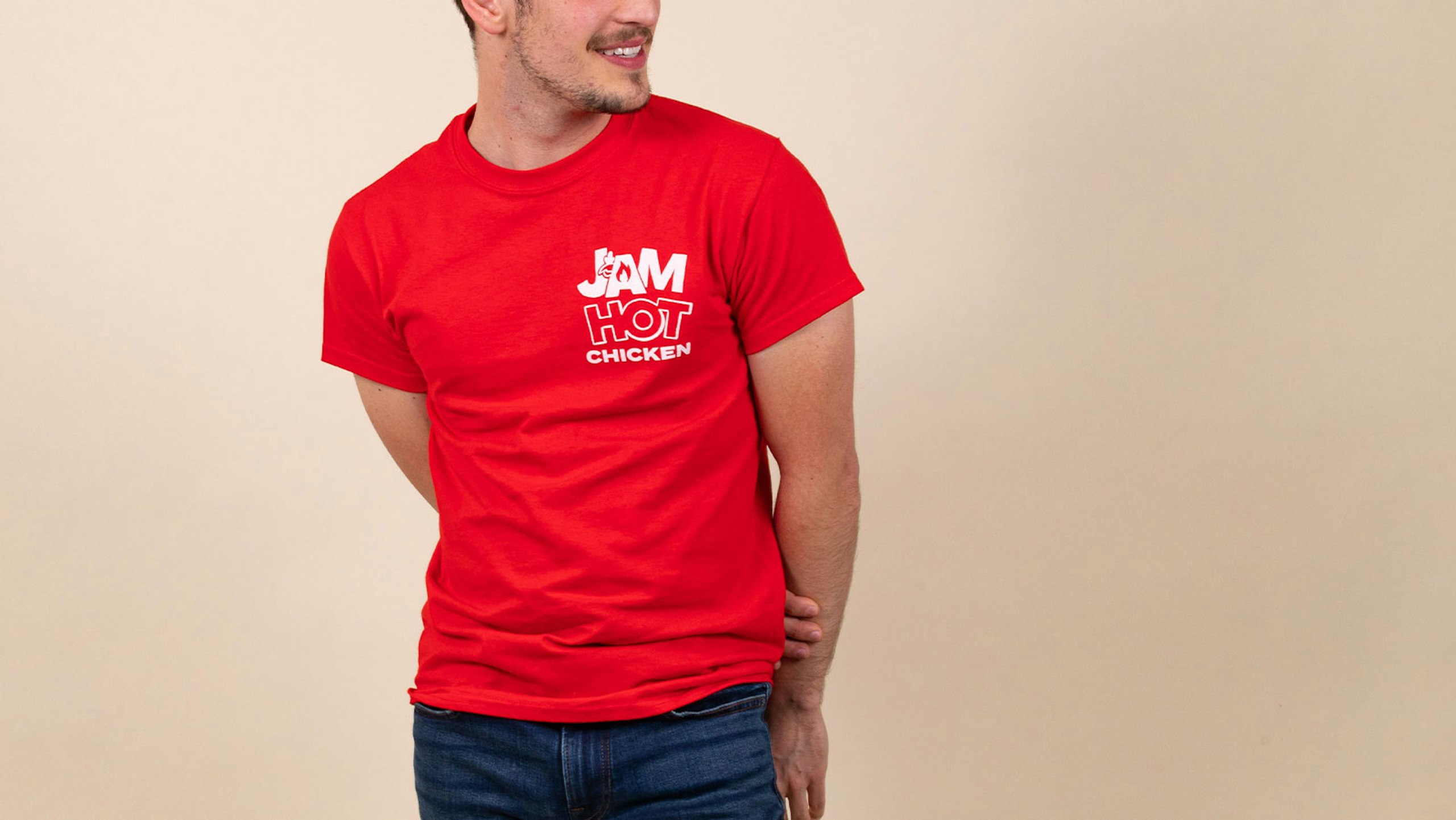 man wearing a Jam Hot red t-shirt