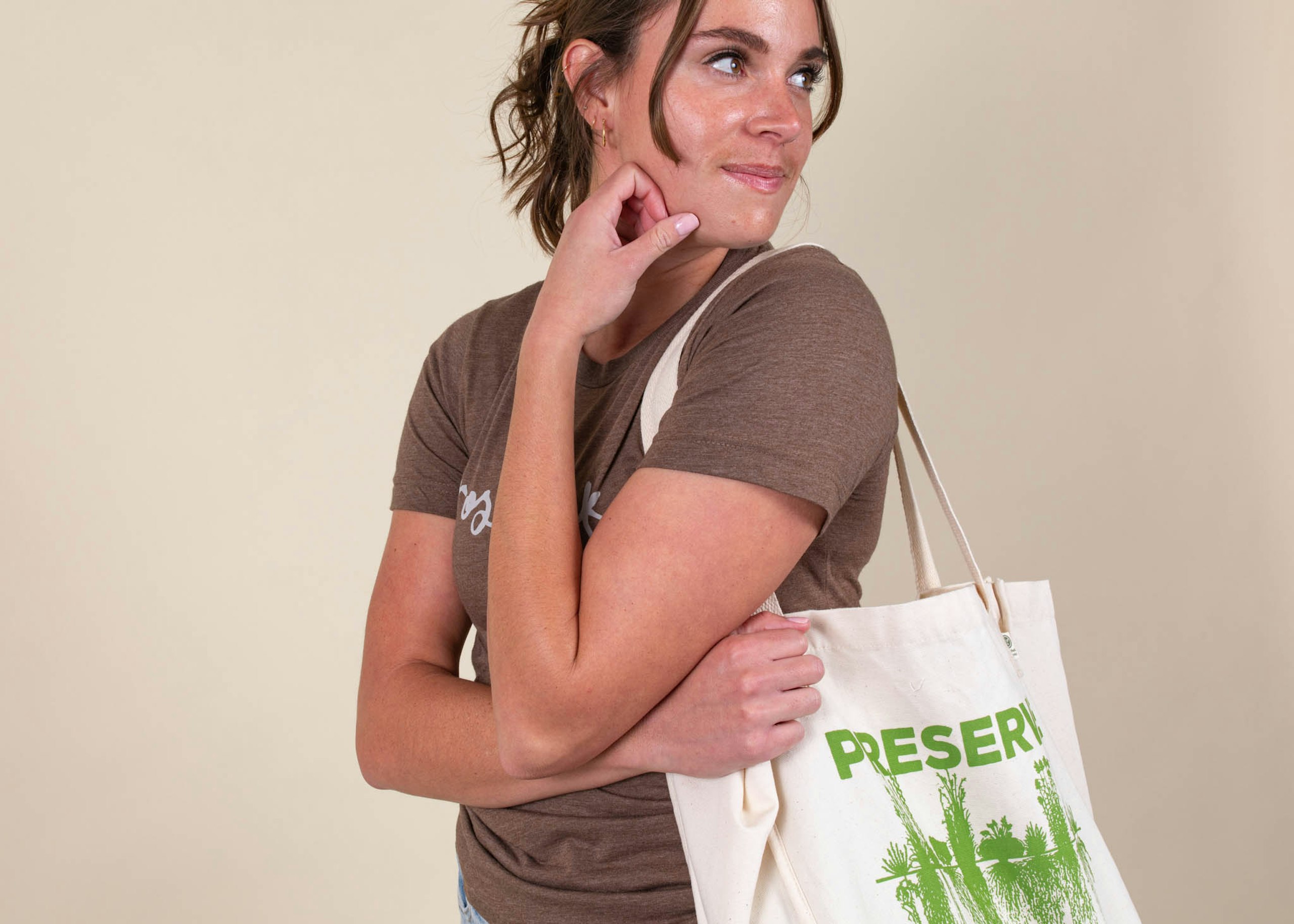 women holding a tote bag