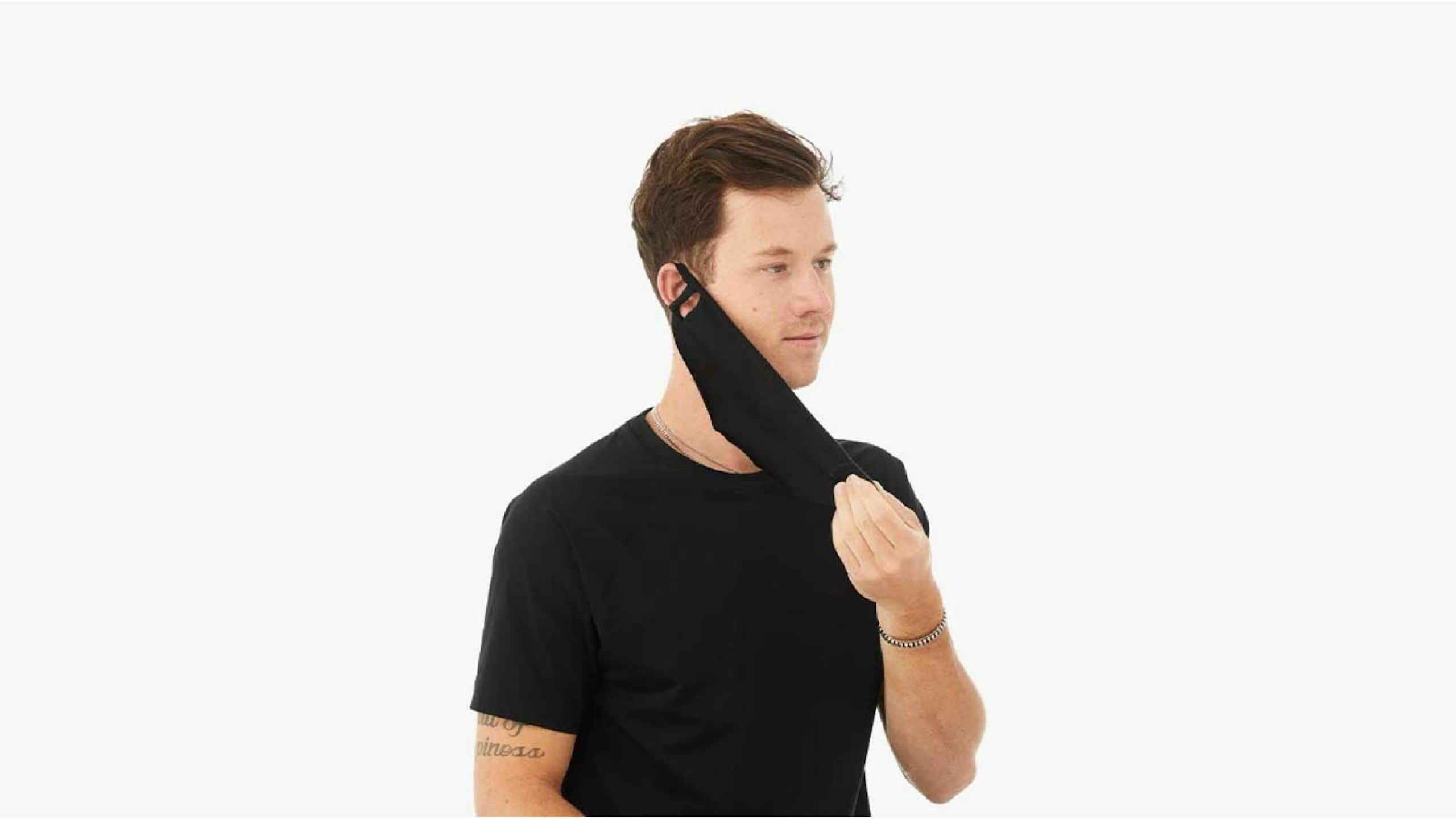 man taking a mask off