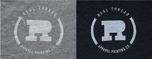 old real thread logo on light gray and black shirt fabric old real thread logo on light gray and black shirt fabric