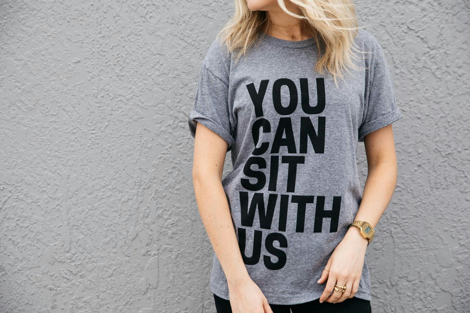 women wearing a gray shirt women wearing a gray shirt