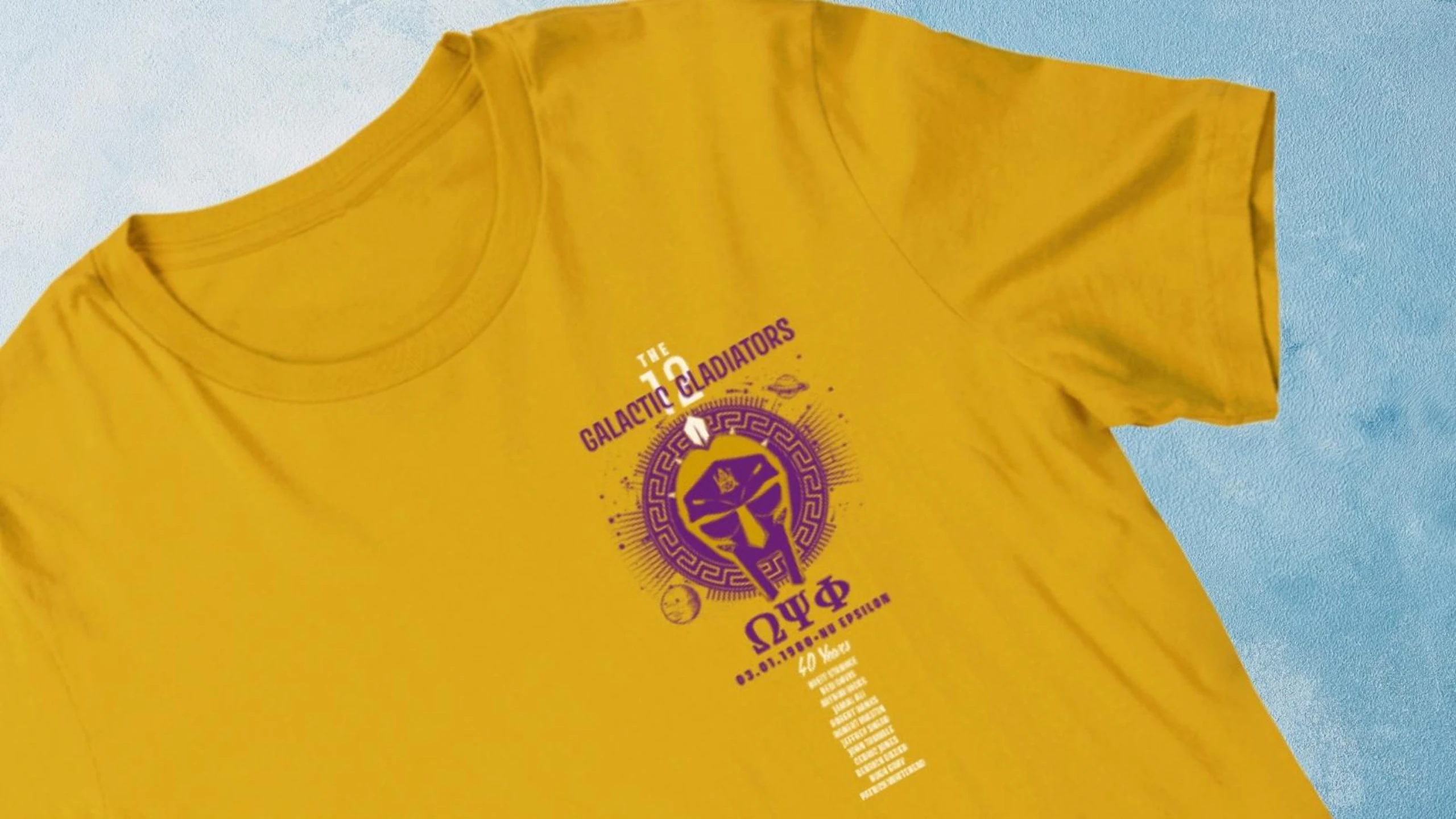 yellow shirt with dark red print