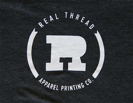 old real thread logo on charcoal fabric old real thread logo on charcoal fabric