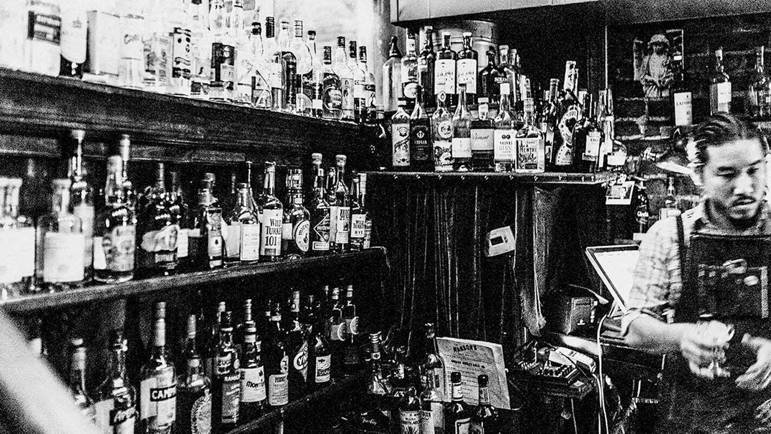 black and white photo of a bar