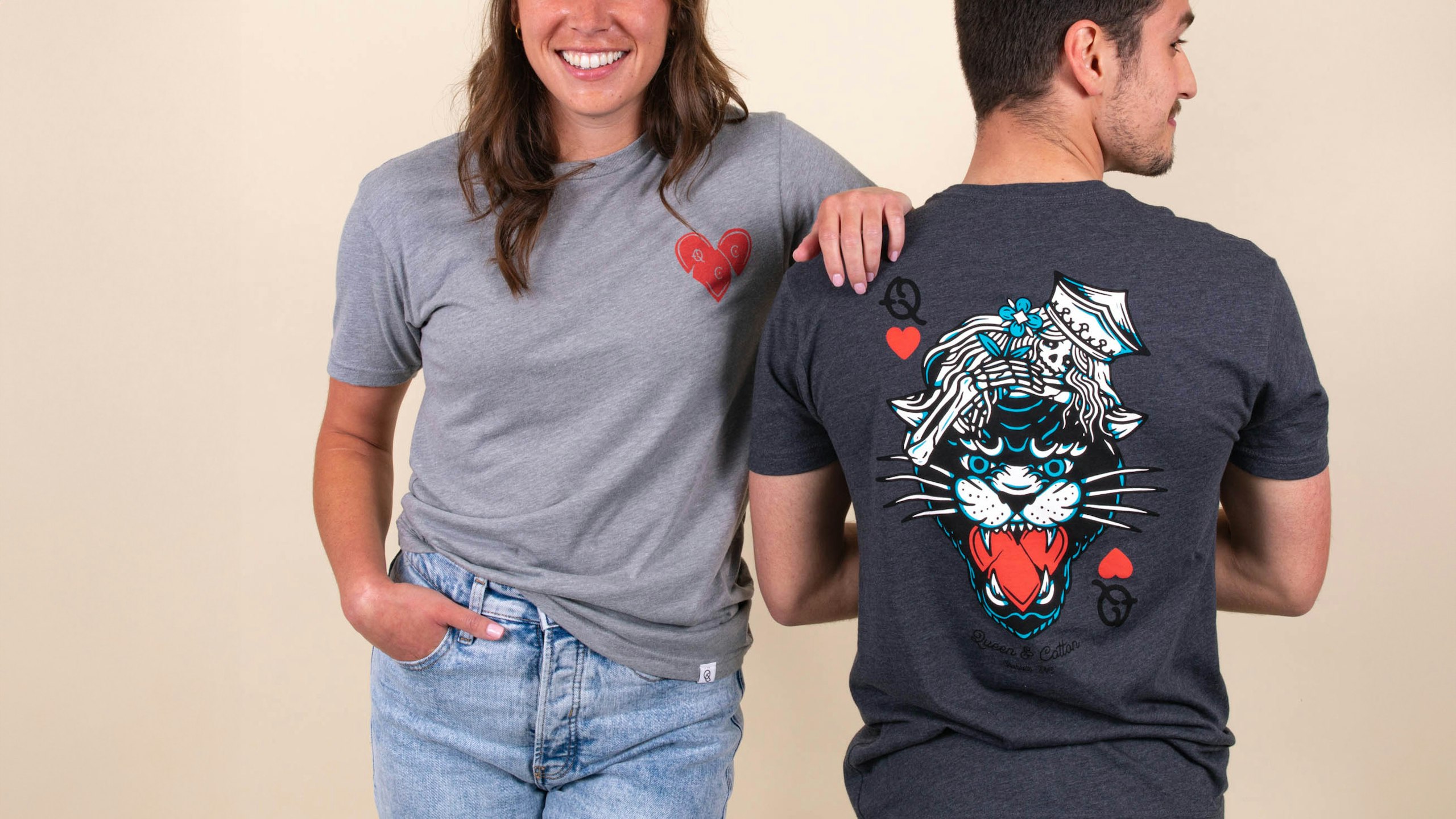 a women wearing the grey shirt and a man wearing a dark grey shirt