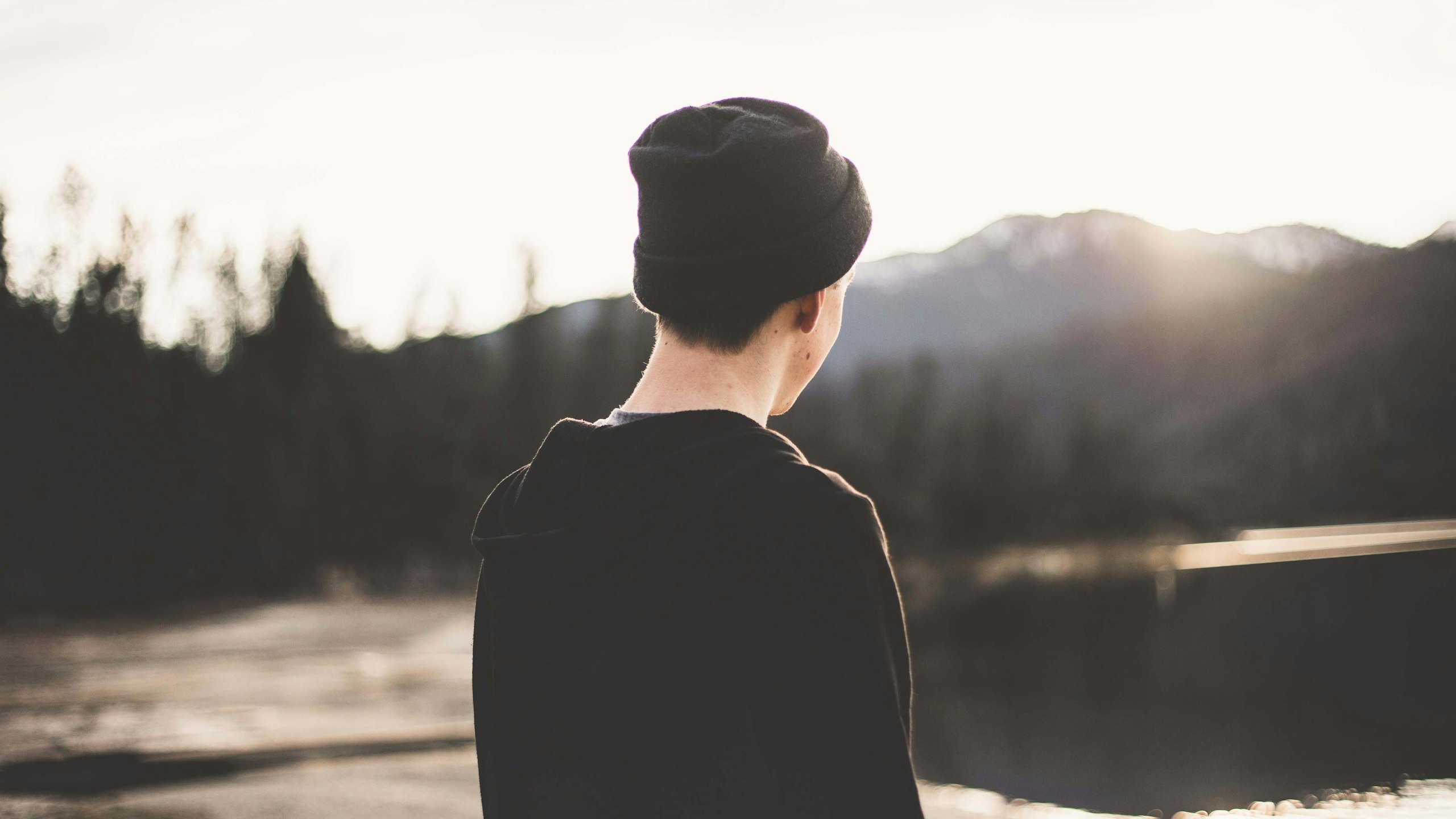 man wearing a black beanie hat