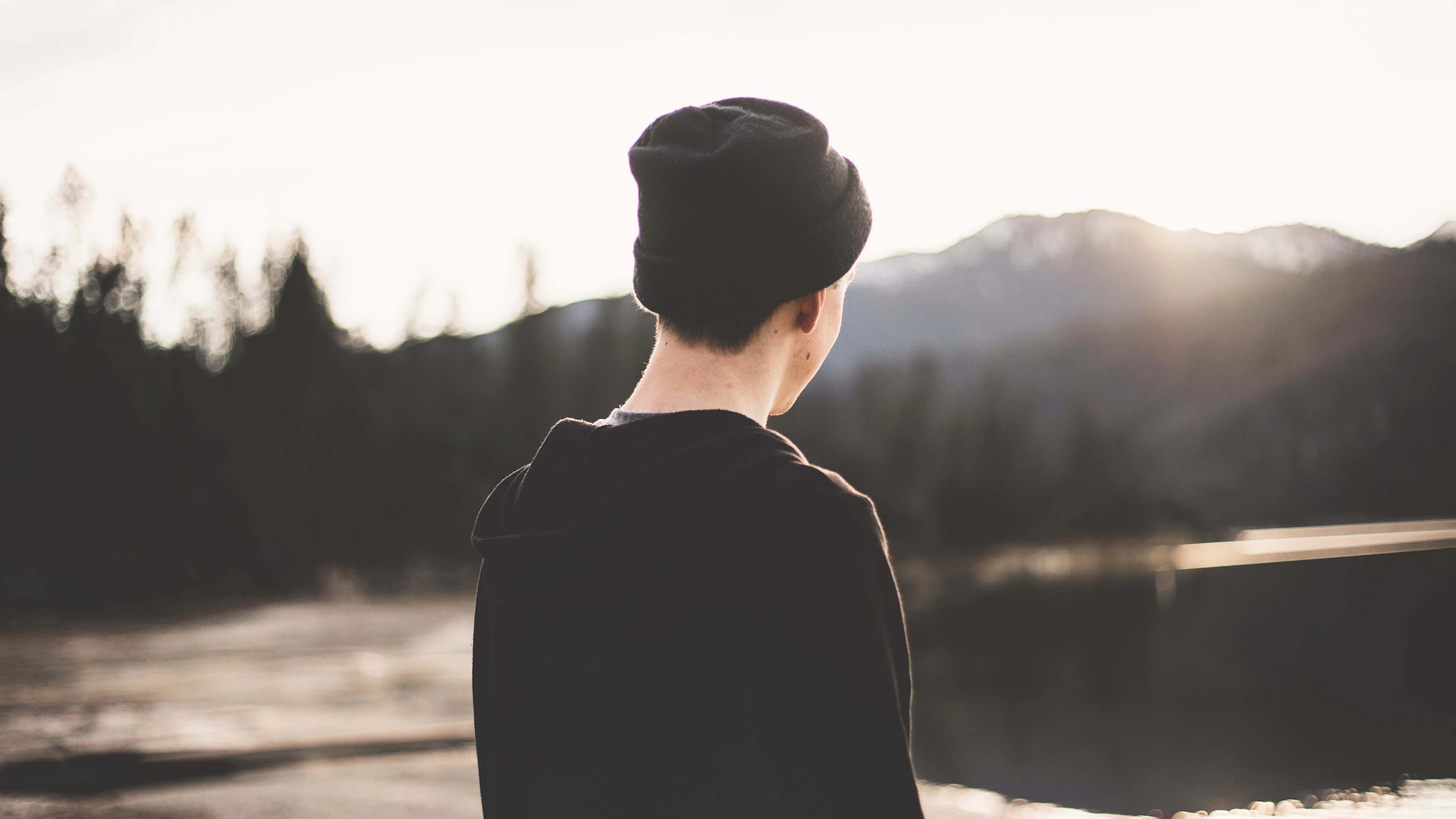 man wearing a black beanie hat