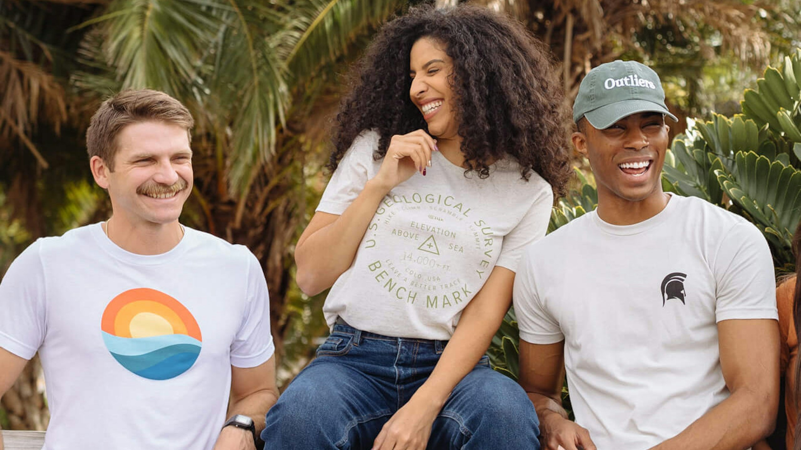 three people wearing white shirts