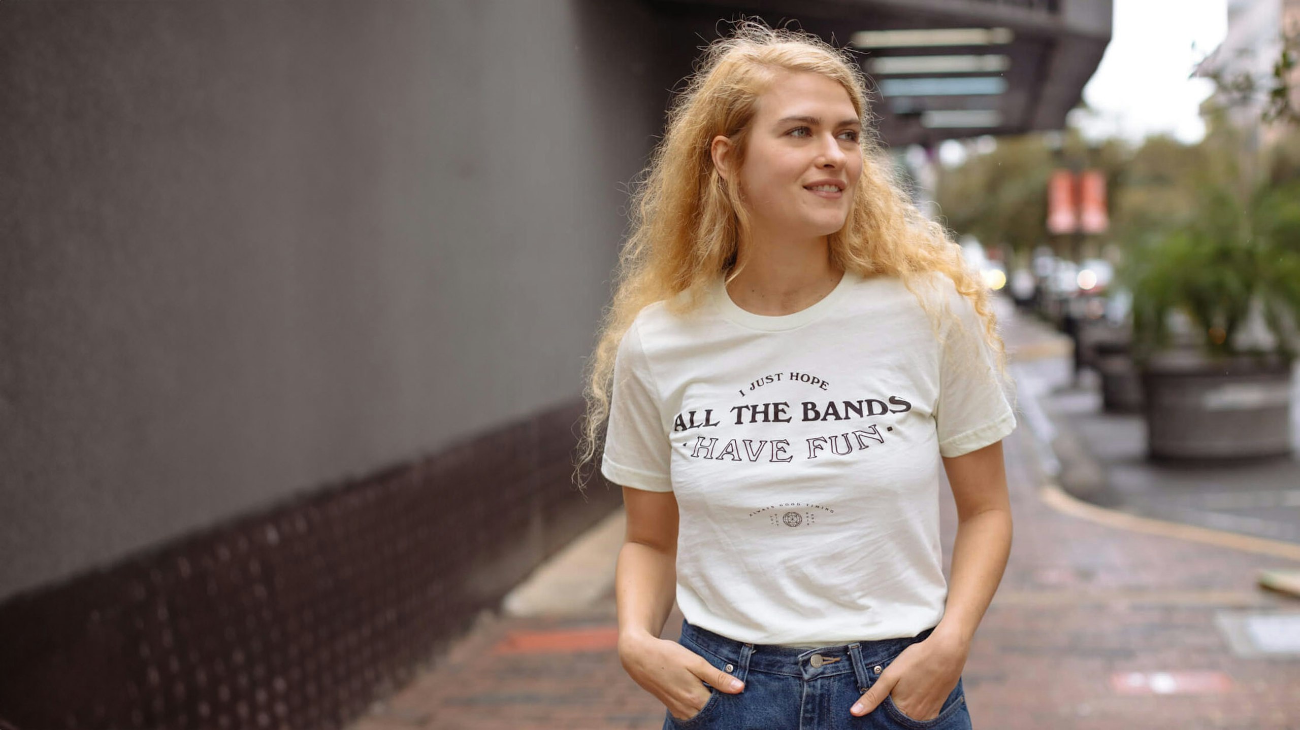 women wearing a white shirt with black text printed on it