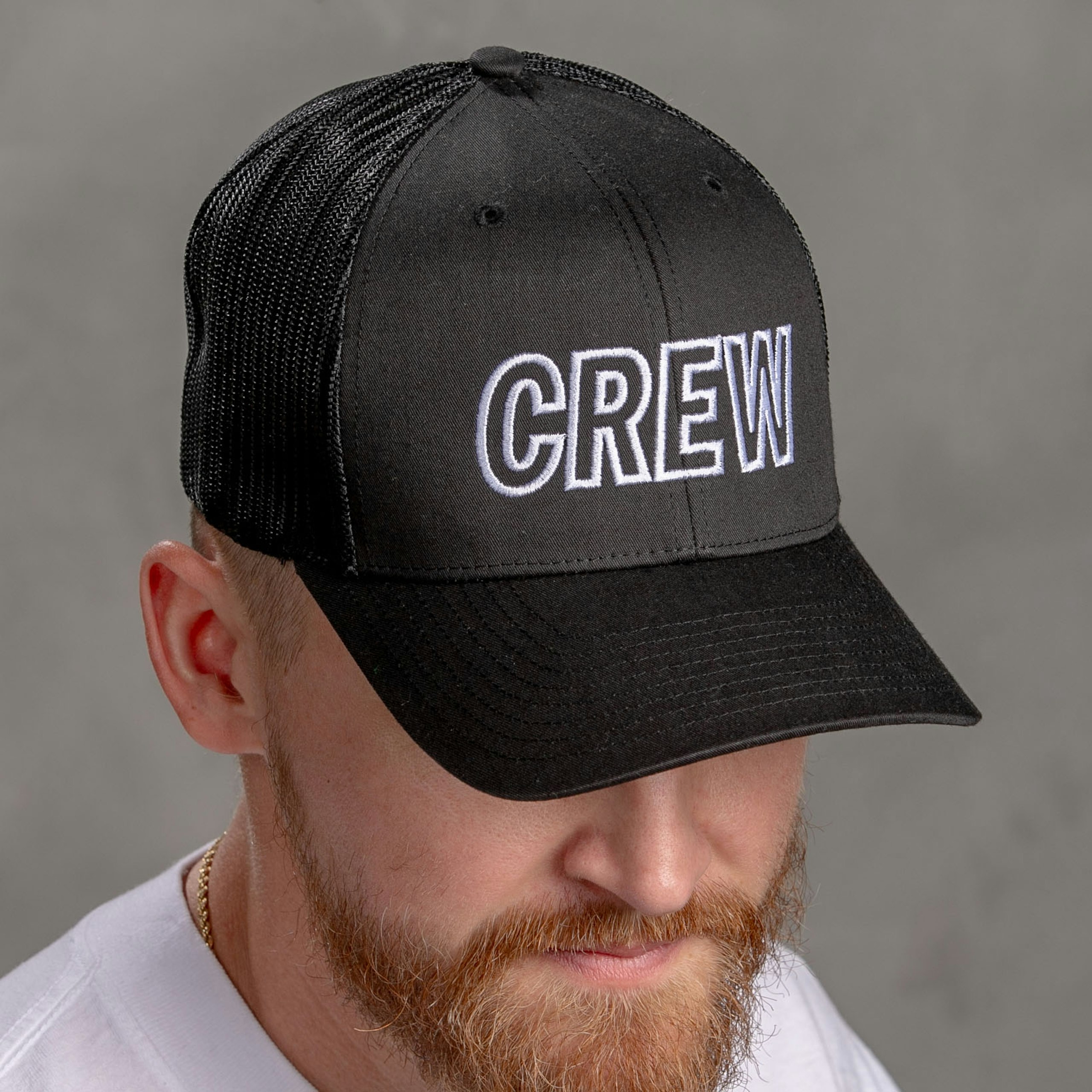 man wearing a black hat