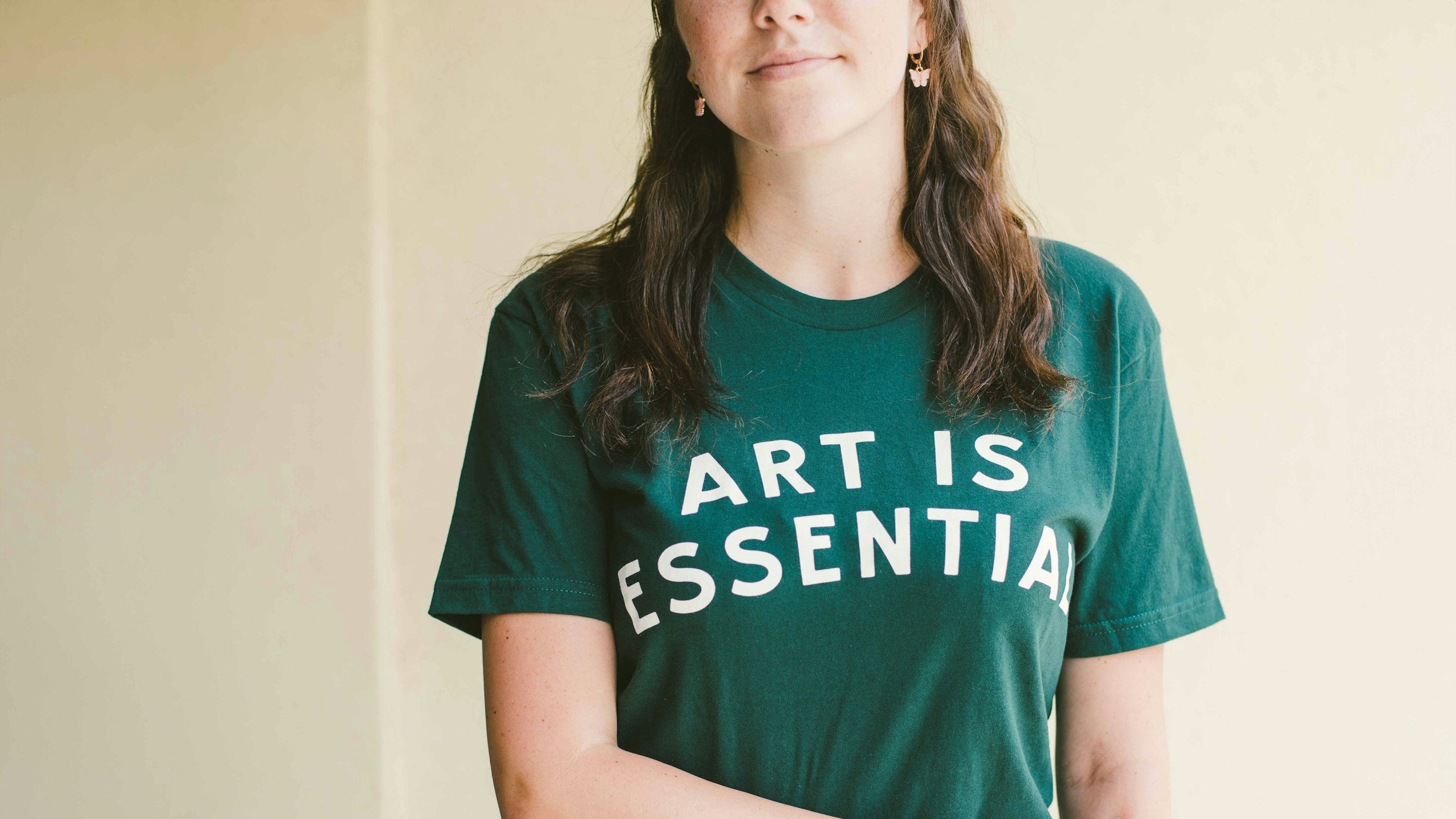 women wearing a green t-shirt