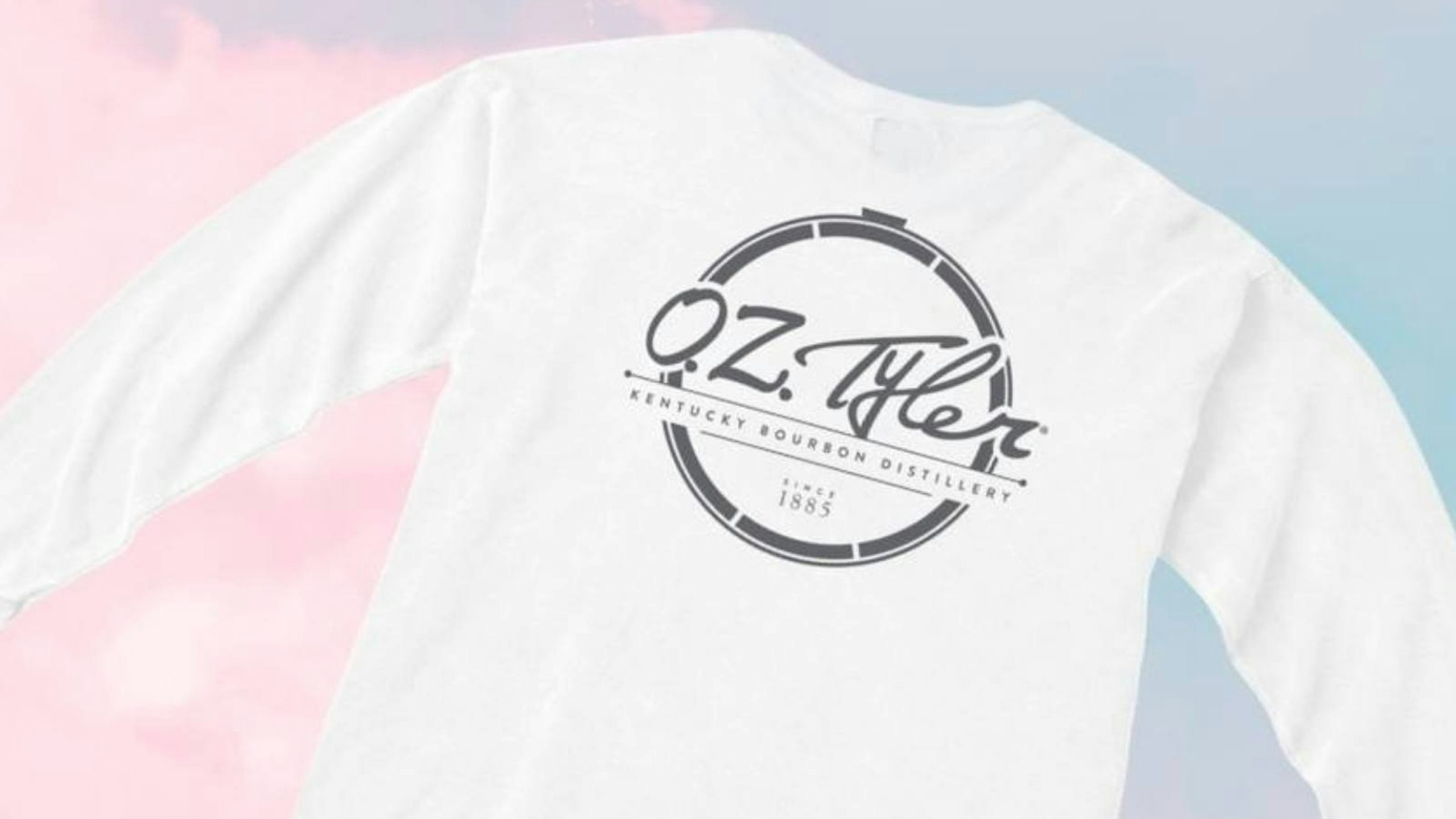long sleeve white shirt over a pink and light blue background