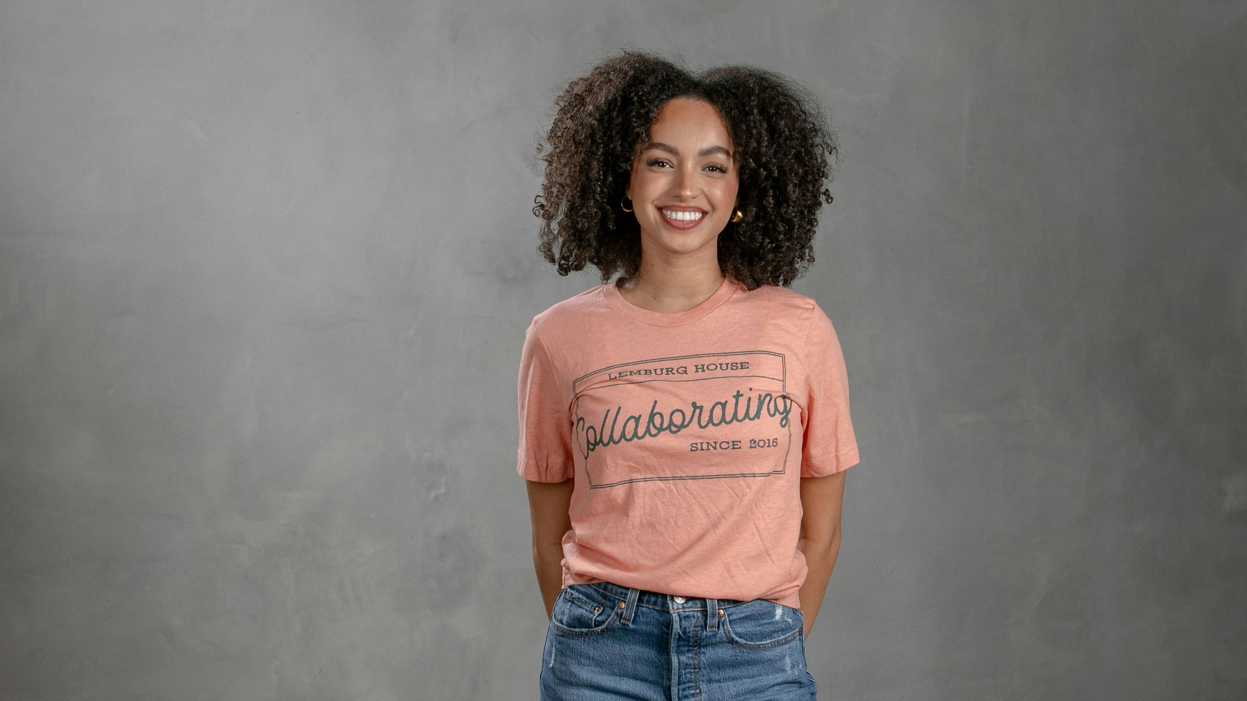 women wearing a peach color t-shirt
