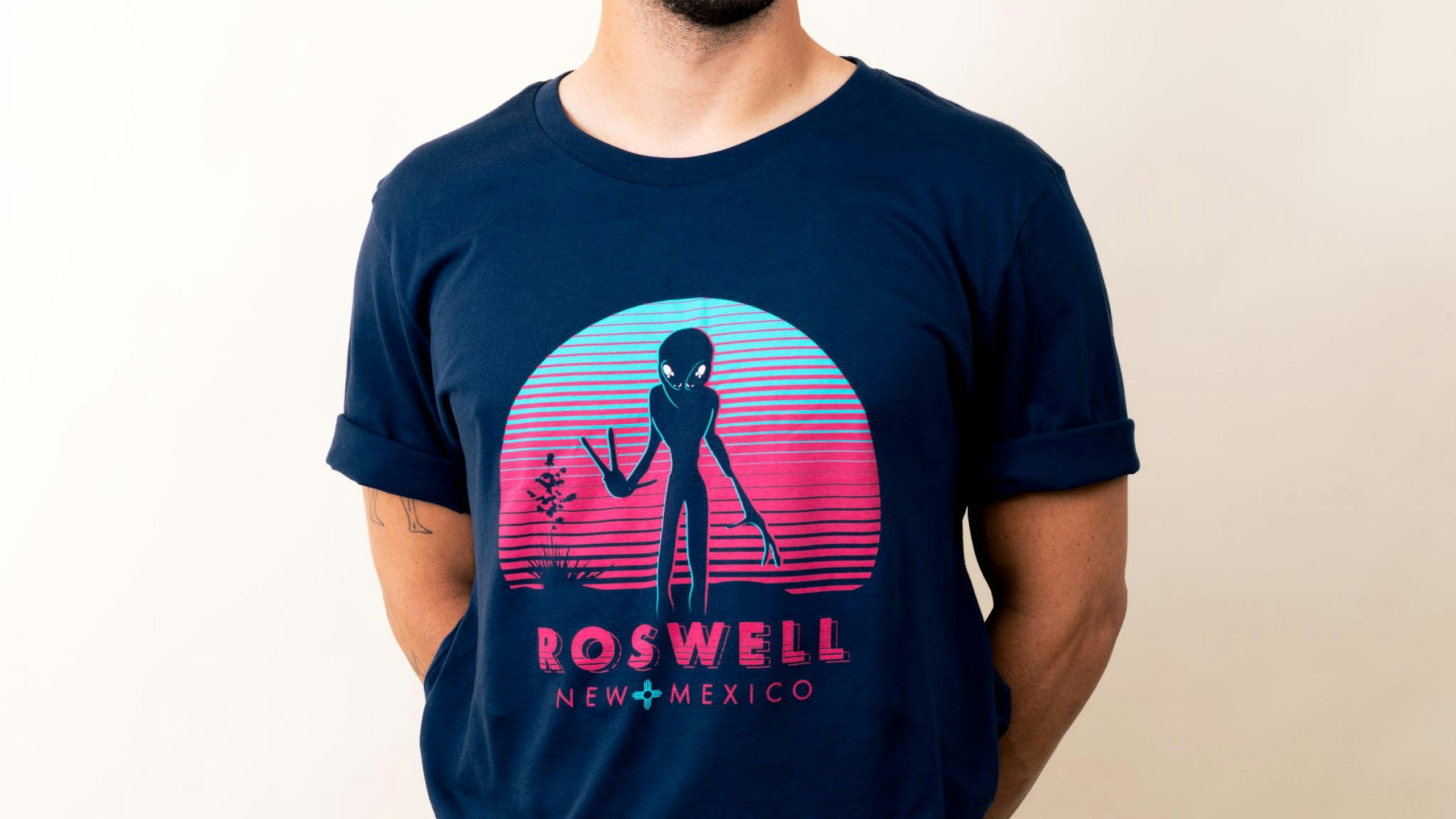 man wearing a navy t-shirt