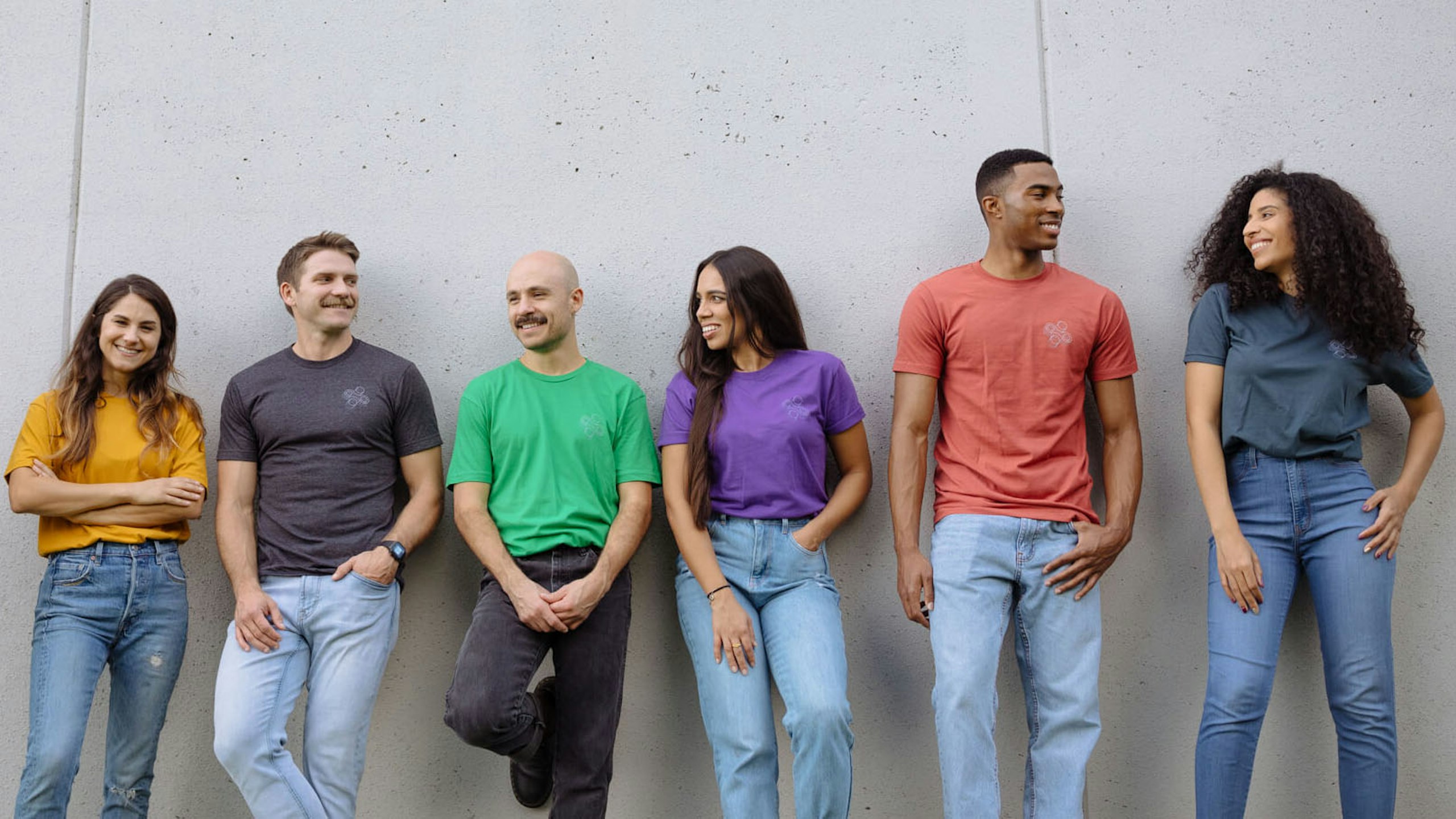 group of people wearing different color shirts