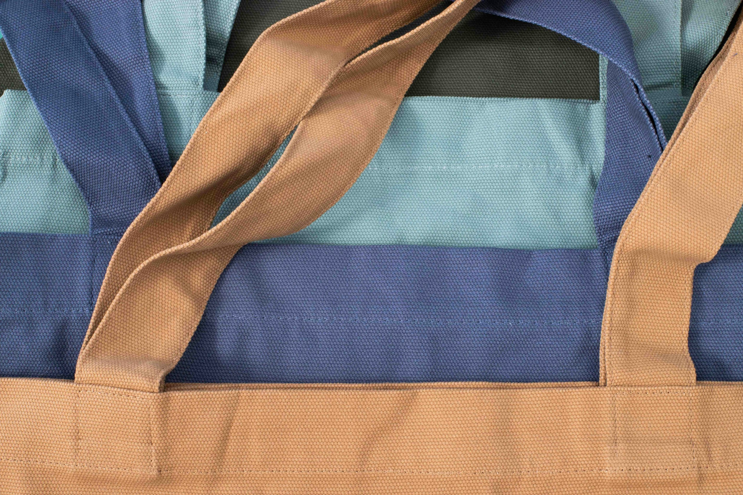brown, purple, light blue, and olive totes