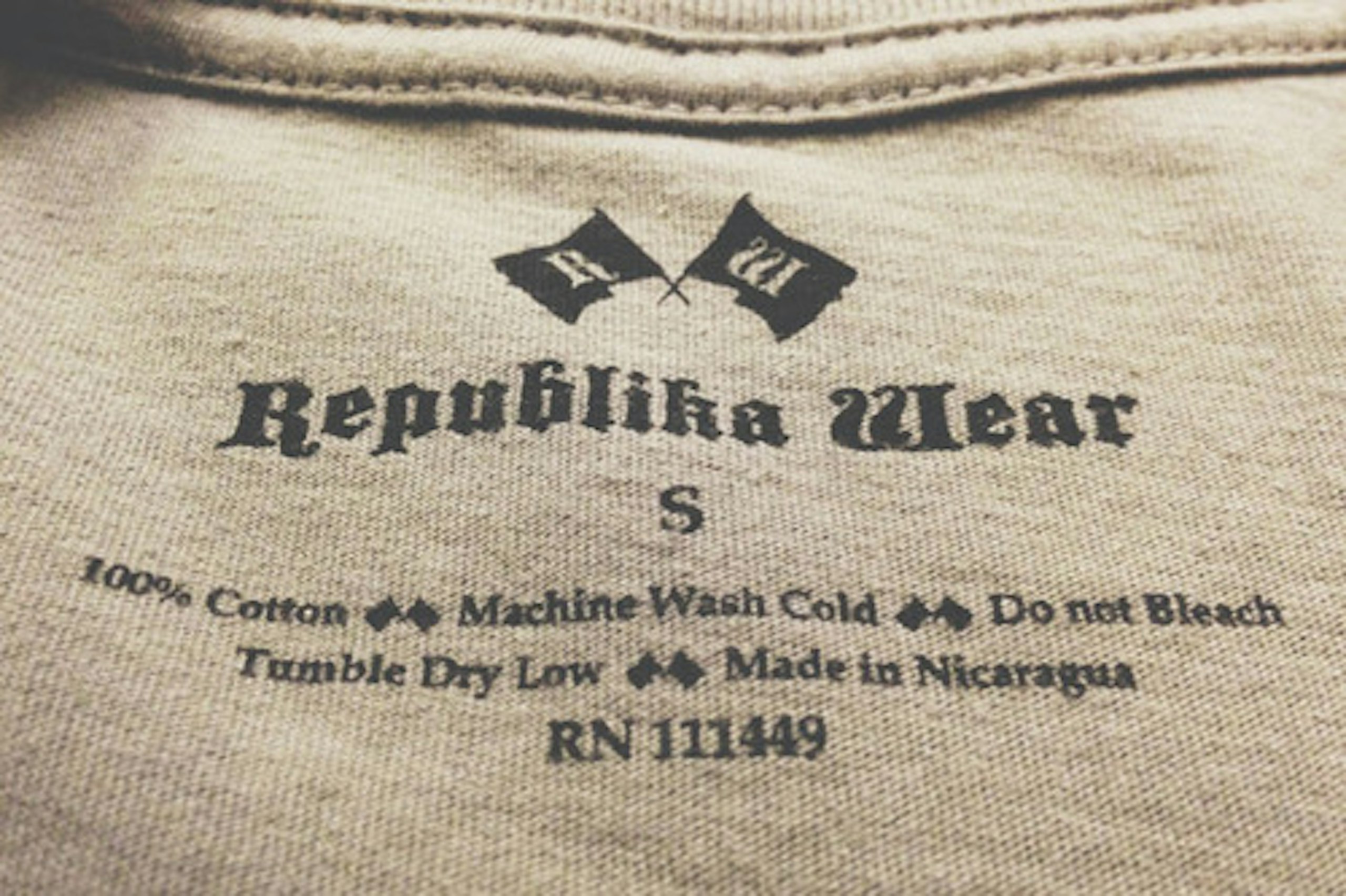 close up of a printed tag on a t-shirt