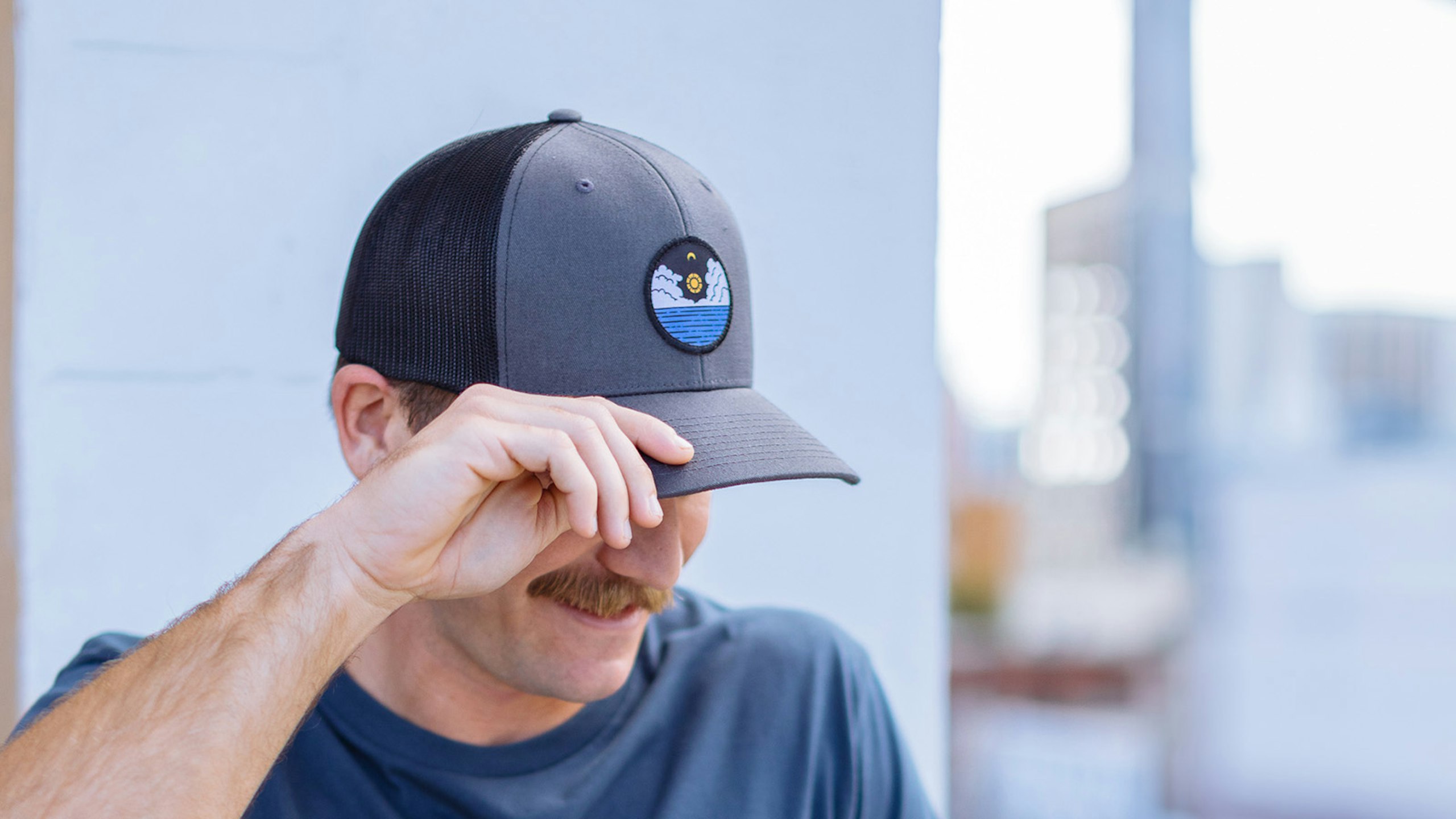 man wearing a trucker hat