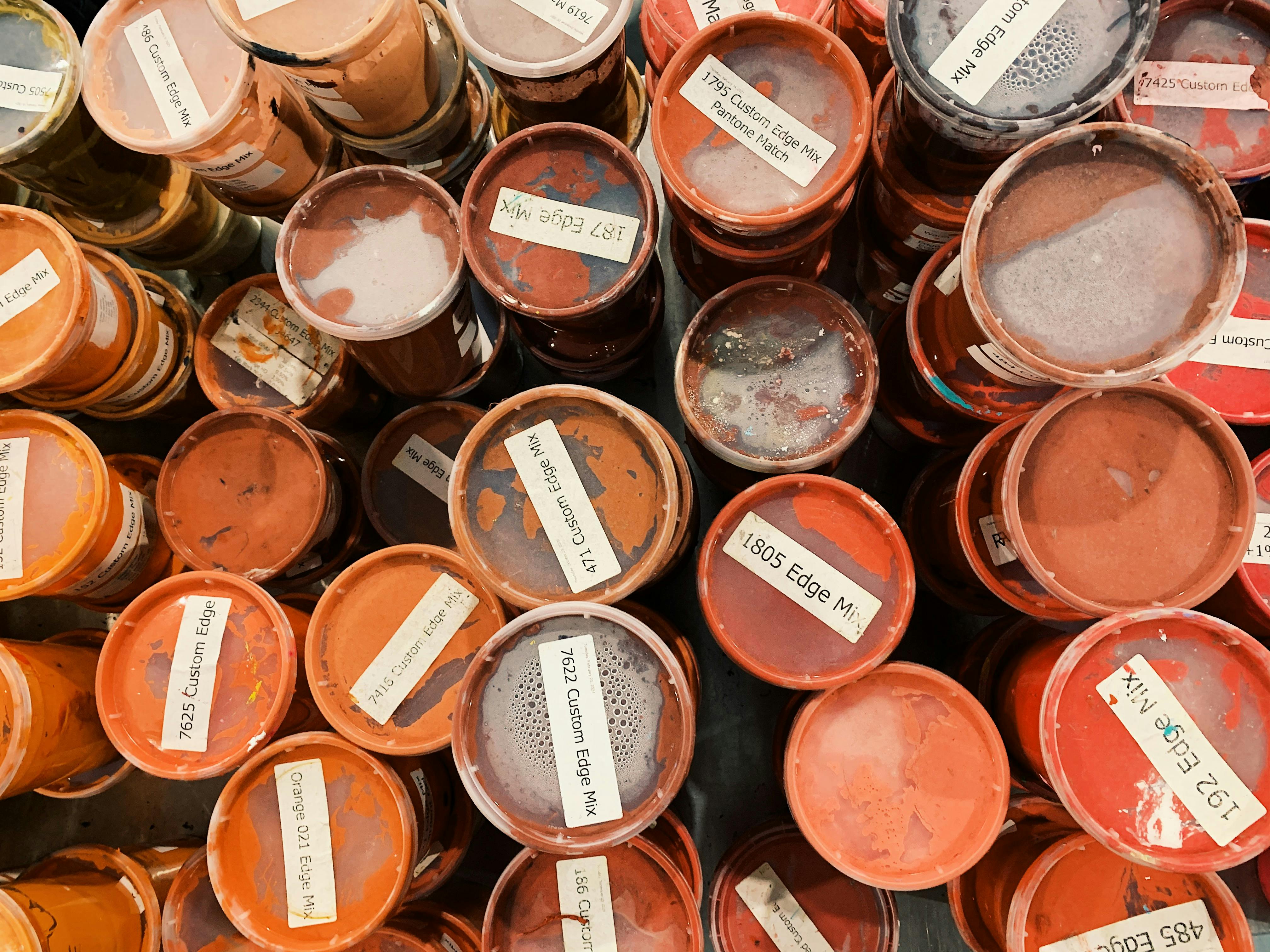 top down look of orange and brown inks top down look of orange and brown inks