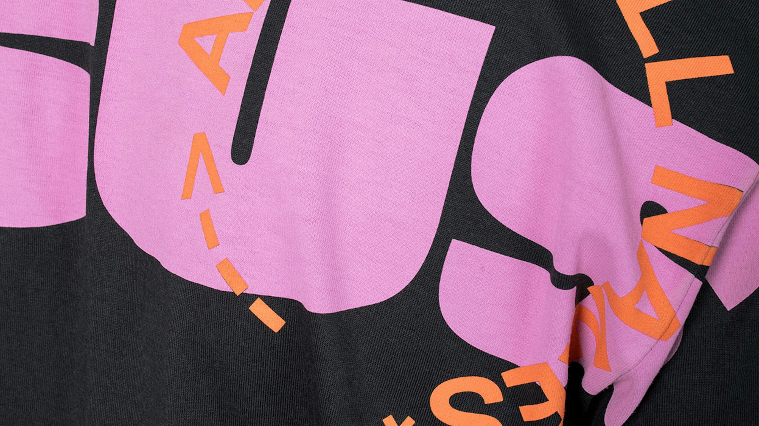 close up view of a printed t-shirt over the seam