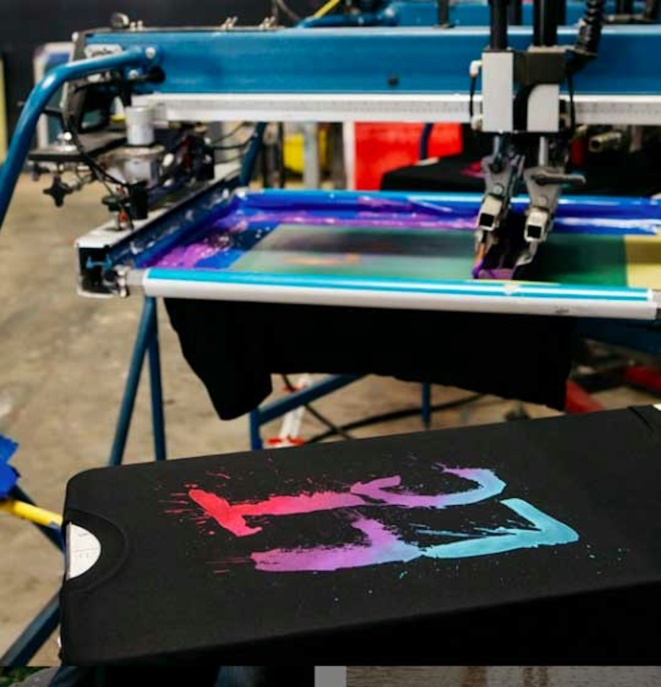black t-shirt on a press