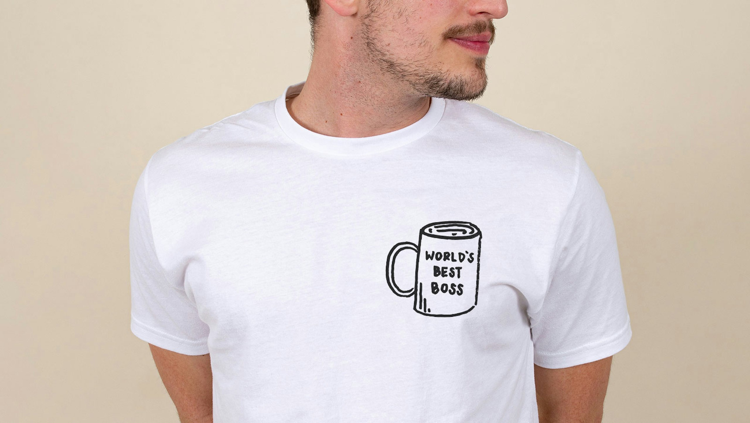 guy wearing a white shirt with world's best boss mug printed on it