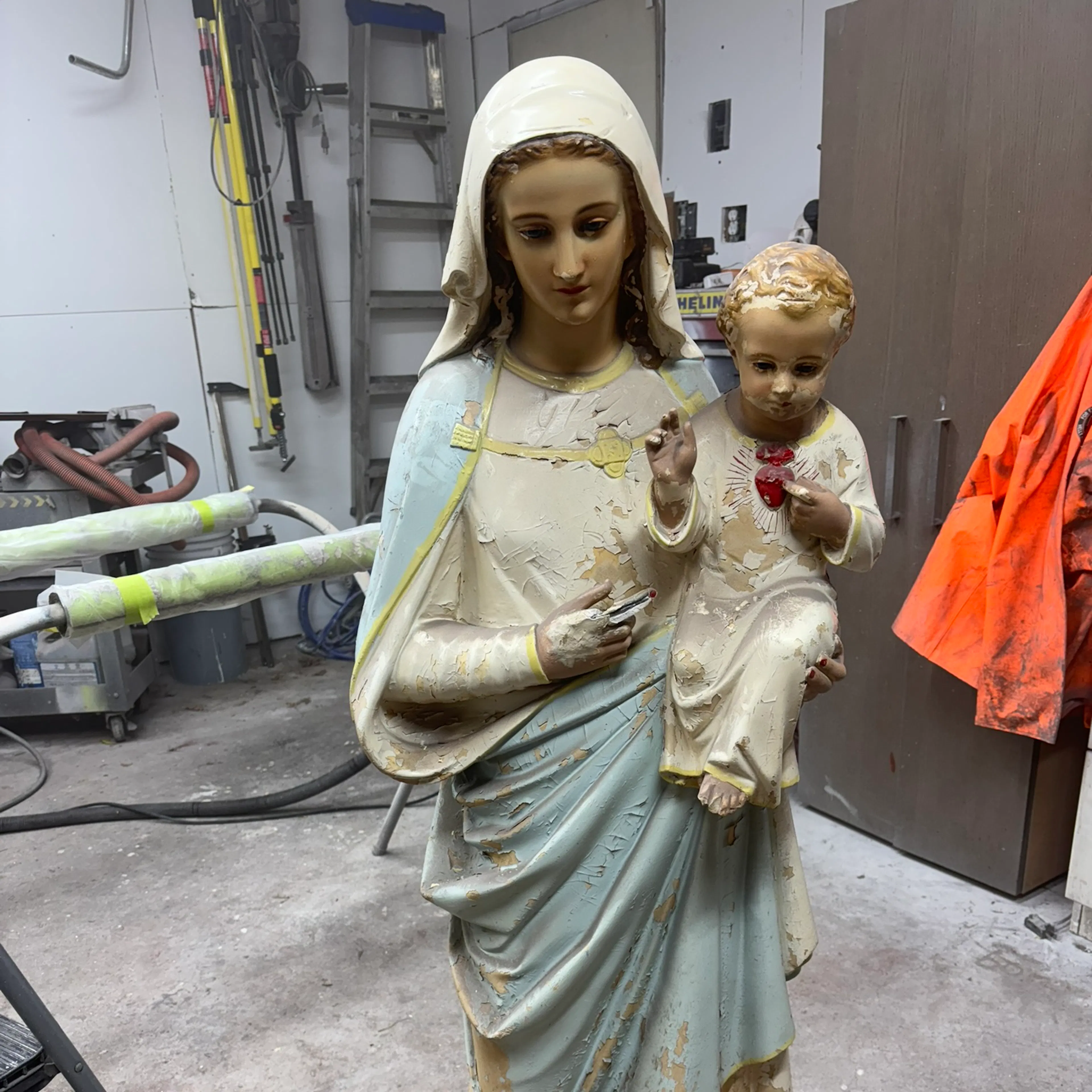 antique virgin mary statue before photo