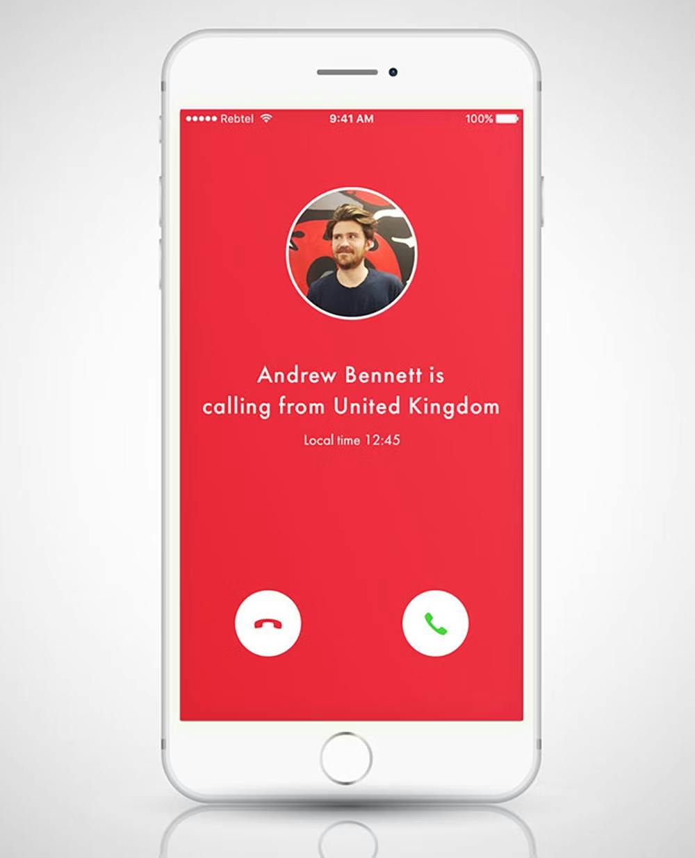 An iphone displaying the Rebtel app, where a customer is receiving a call from someone in the UK named Andrew Bennet.