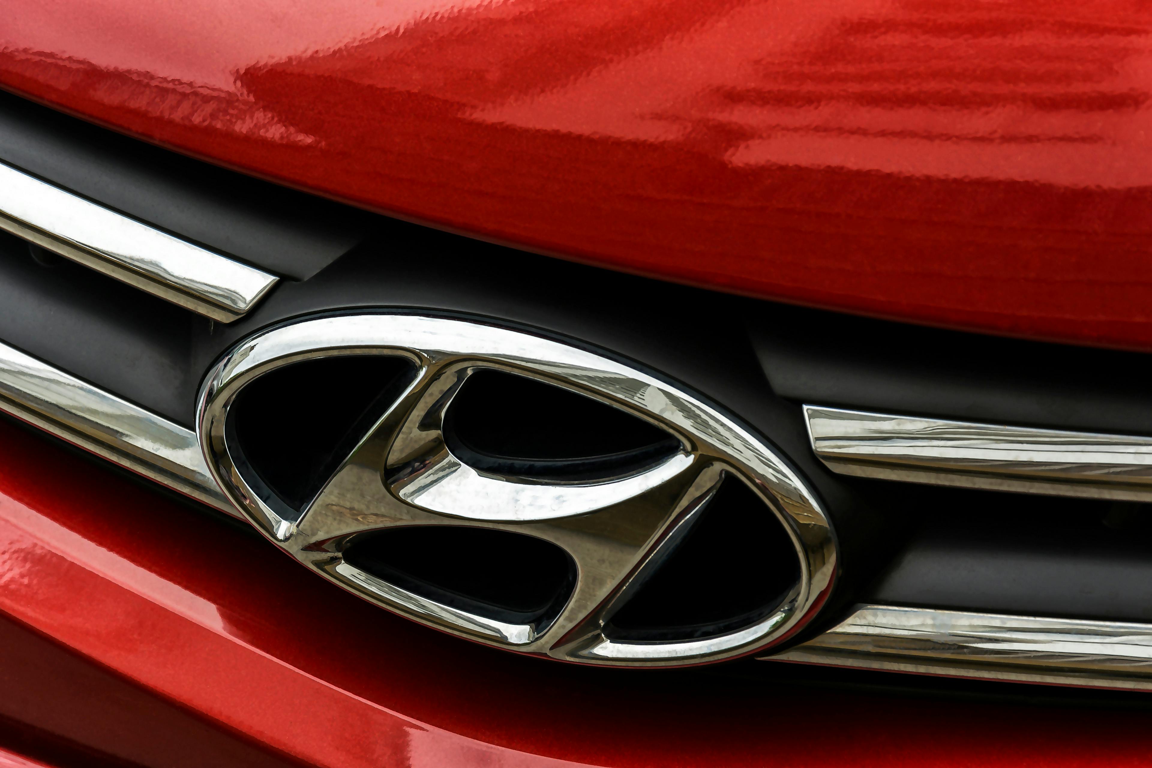 a logo of Hyundai,  an automobile company