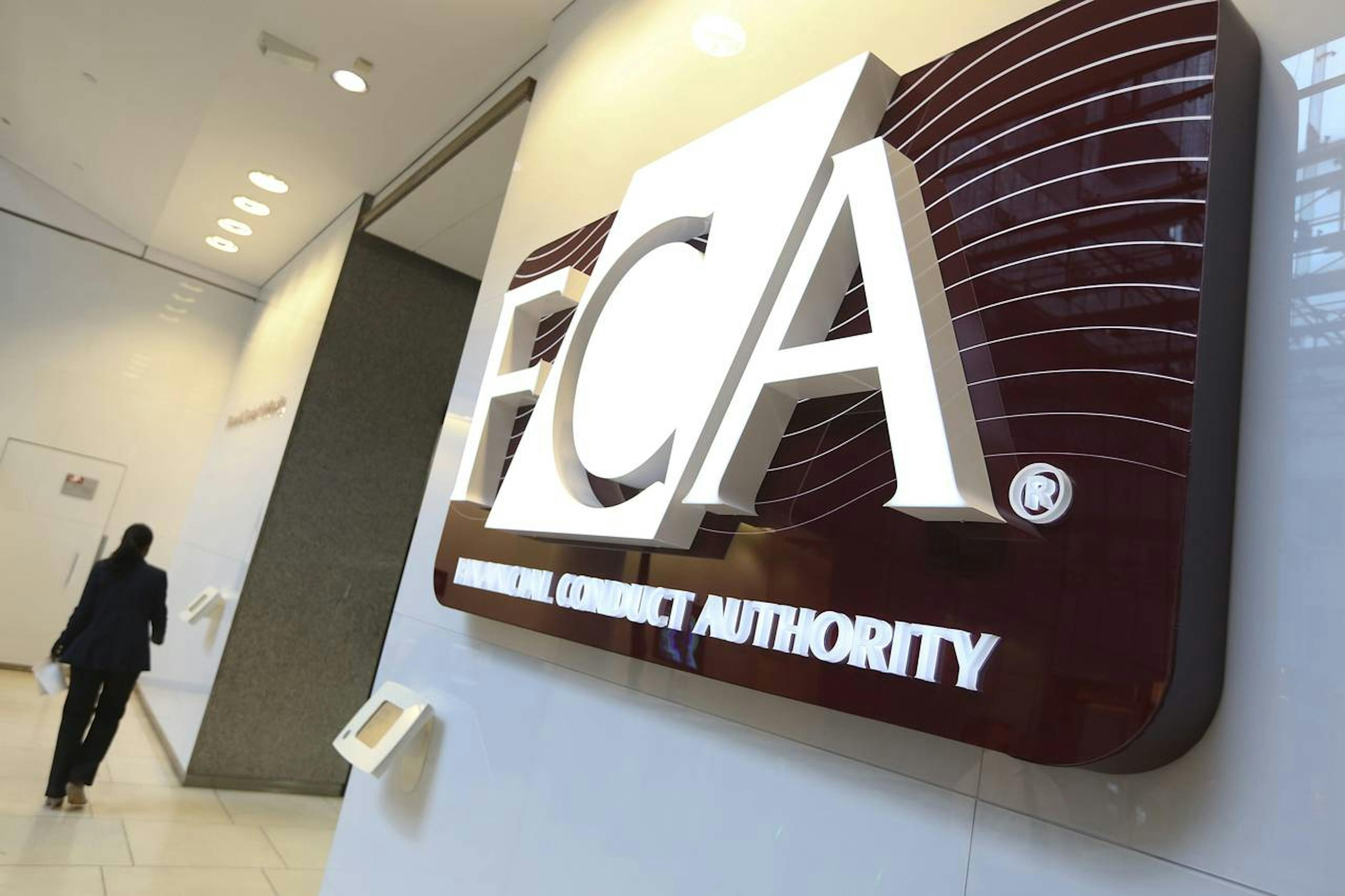 FCA logo with a walking woman as background