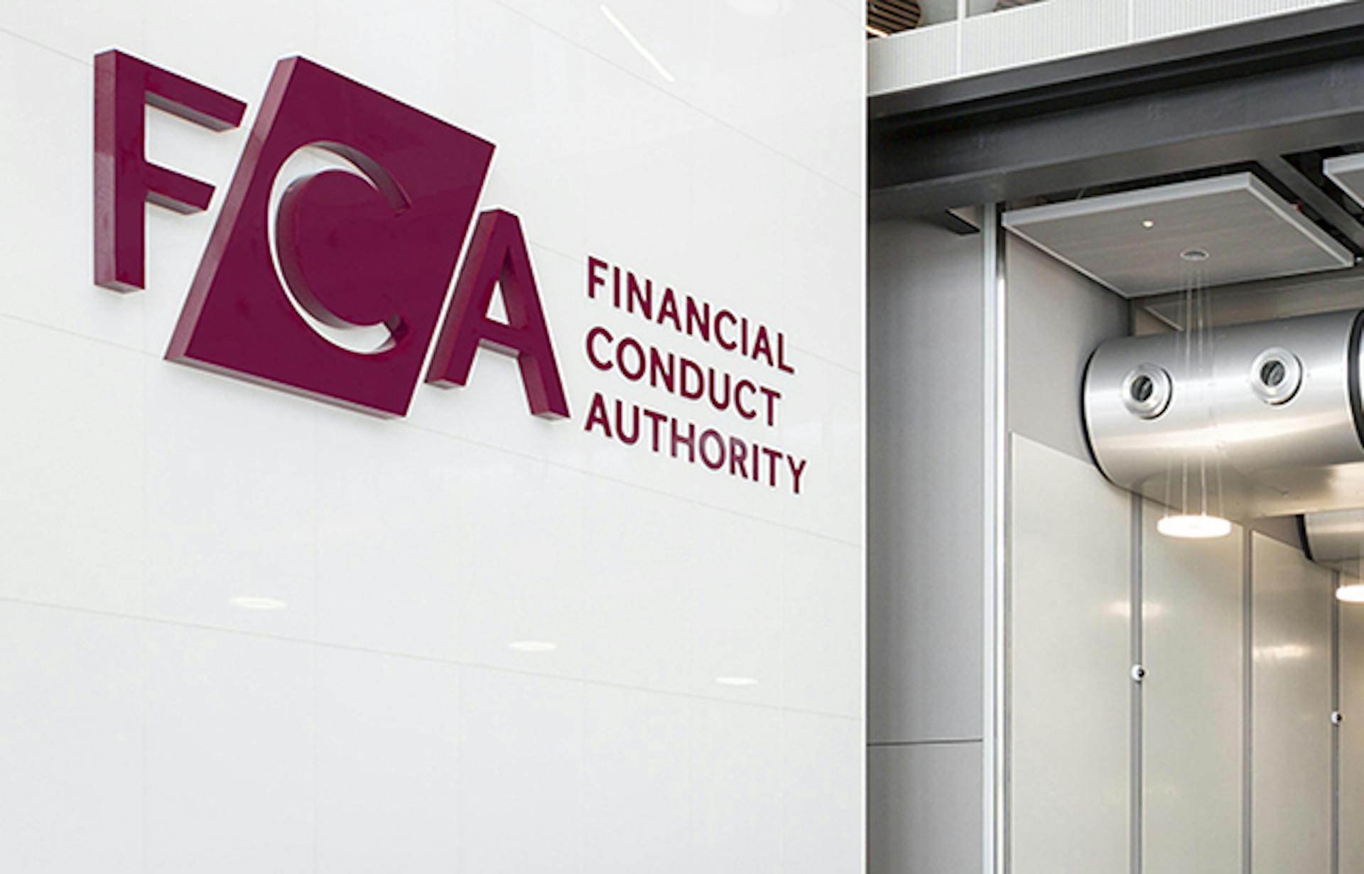 An office wall with the logo of the Financial Conduct Authority (FCA)