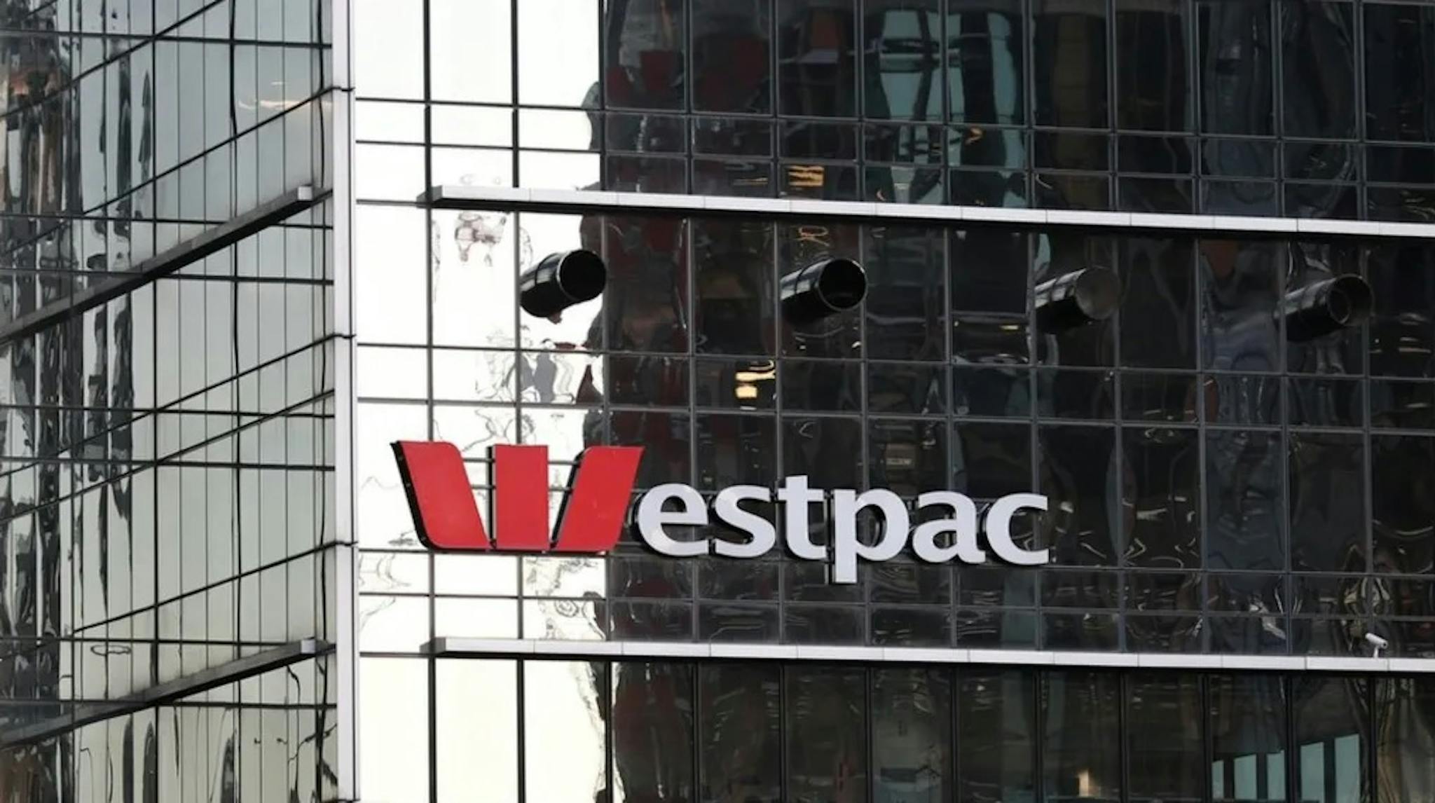 Westpac logo on building exterior with one-way glass panes