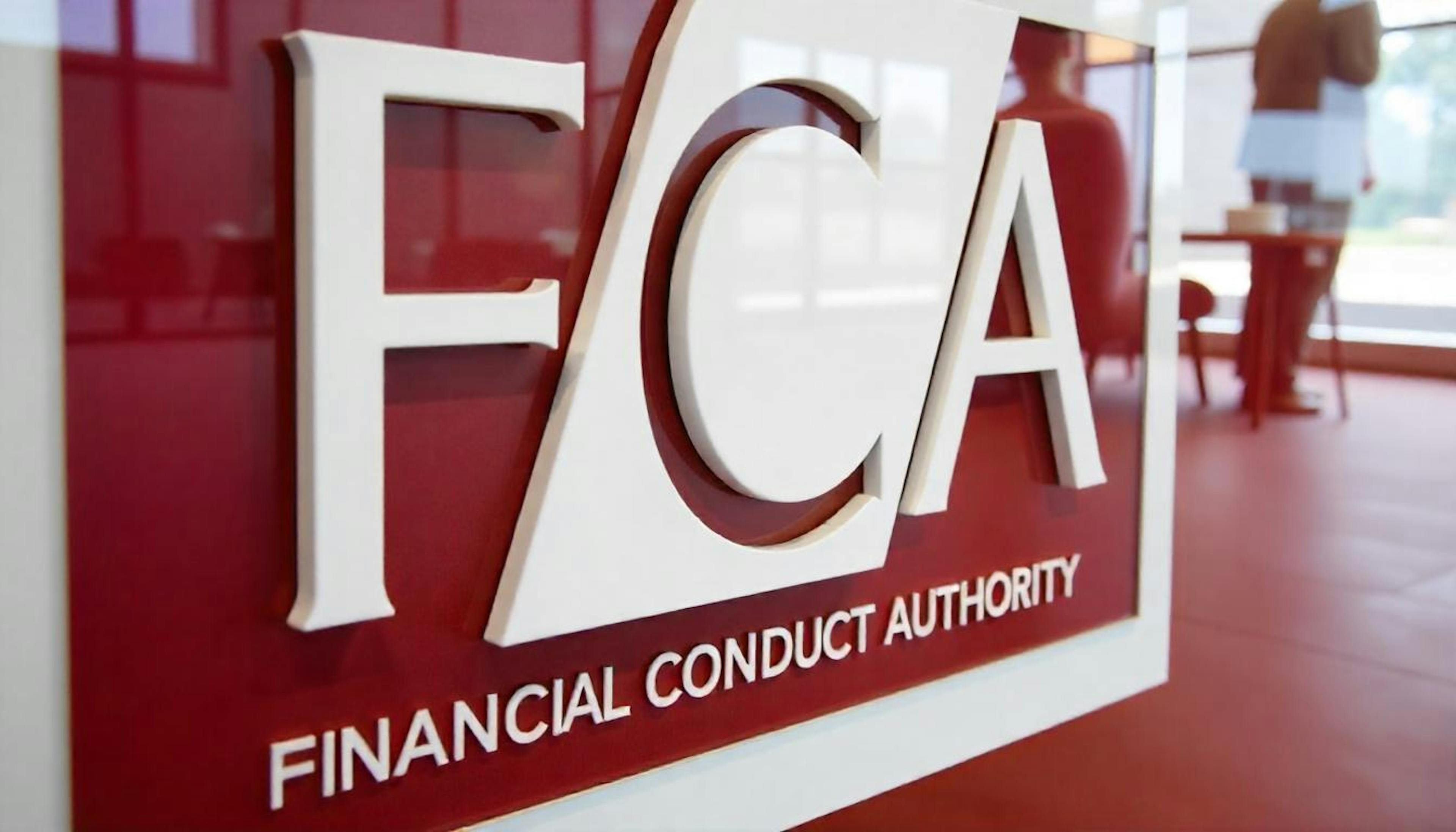 FCA logo with men at the back