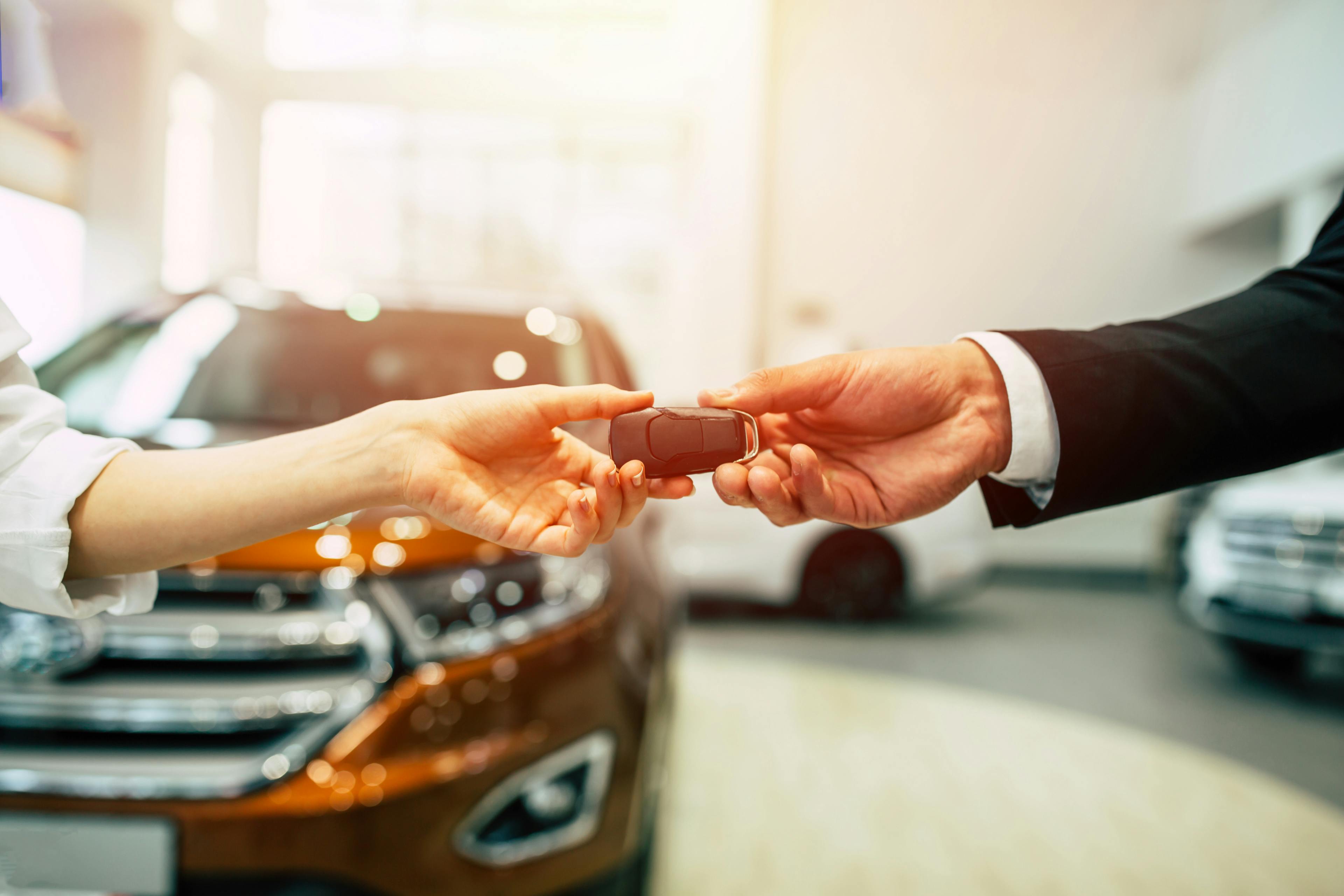 person buying a car from a dealership