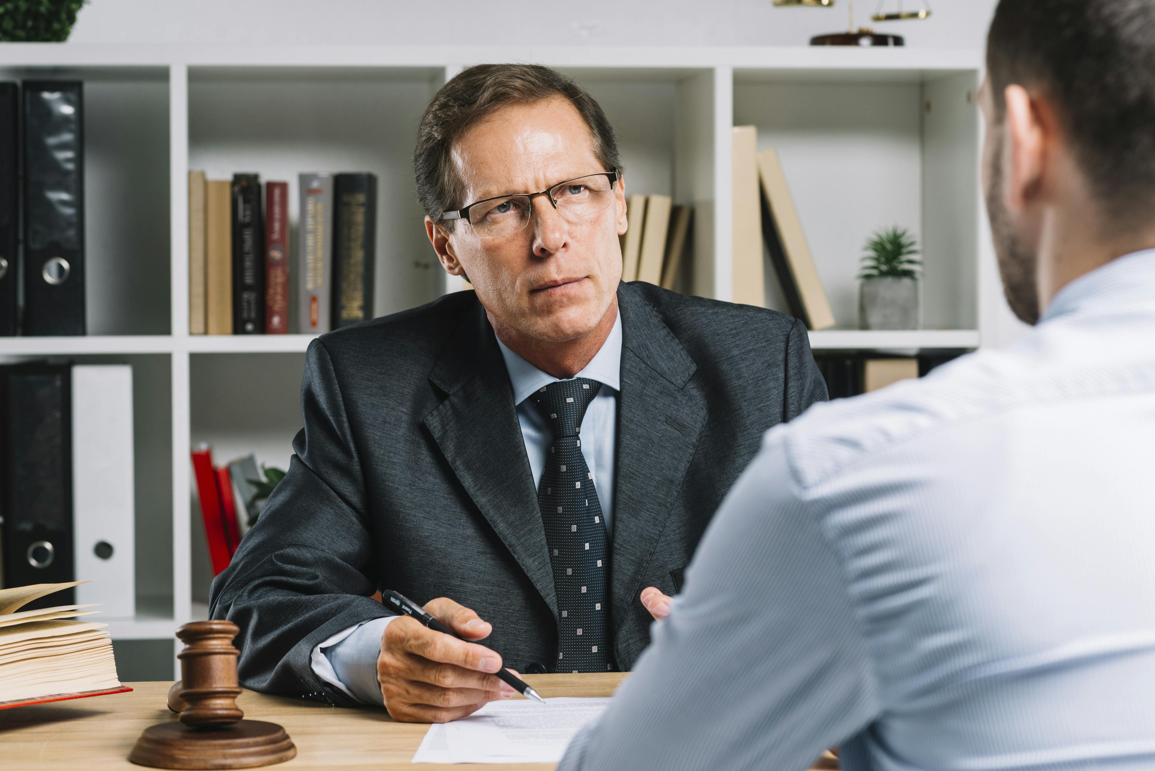 client talking to a lawyer