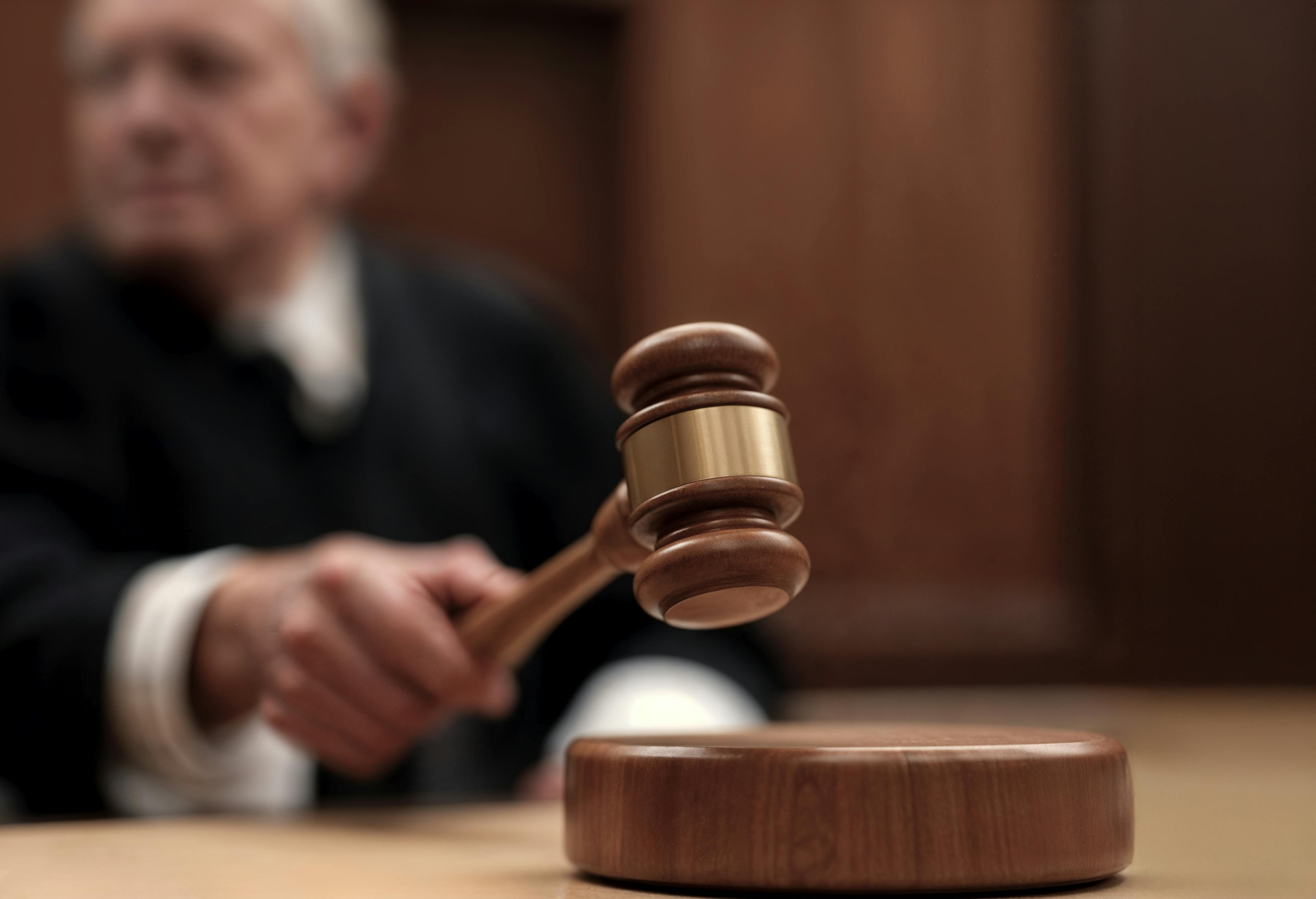 judge with gavel in a courtroom