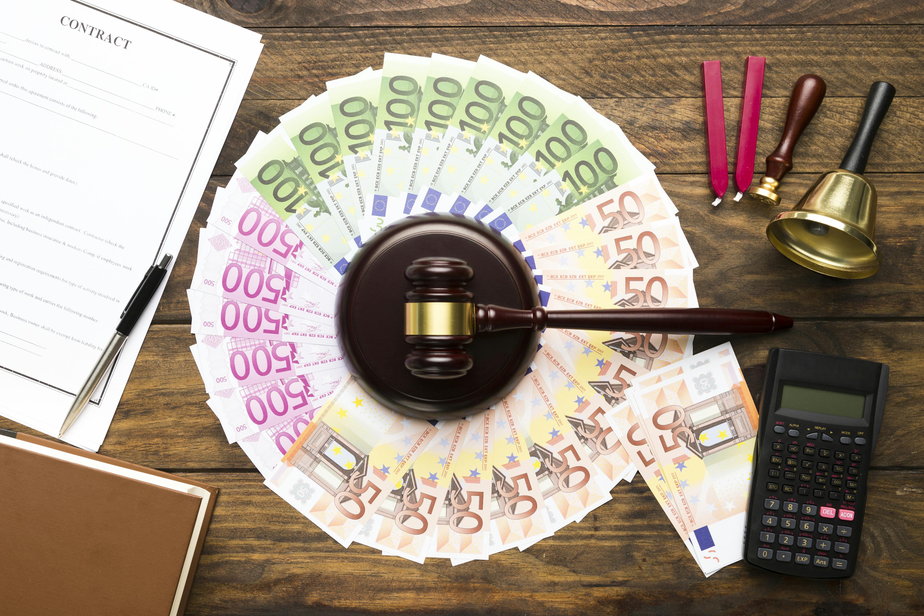 money and gavel on a table