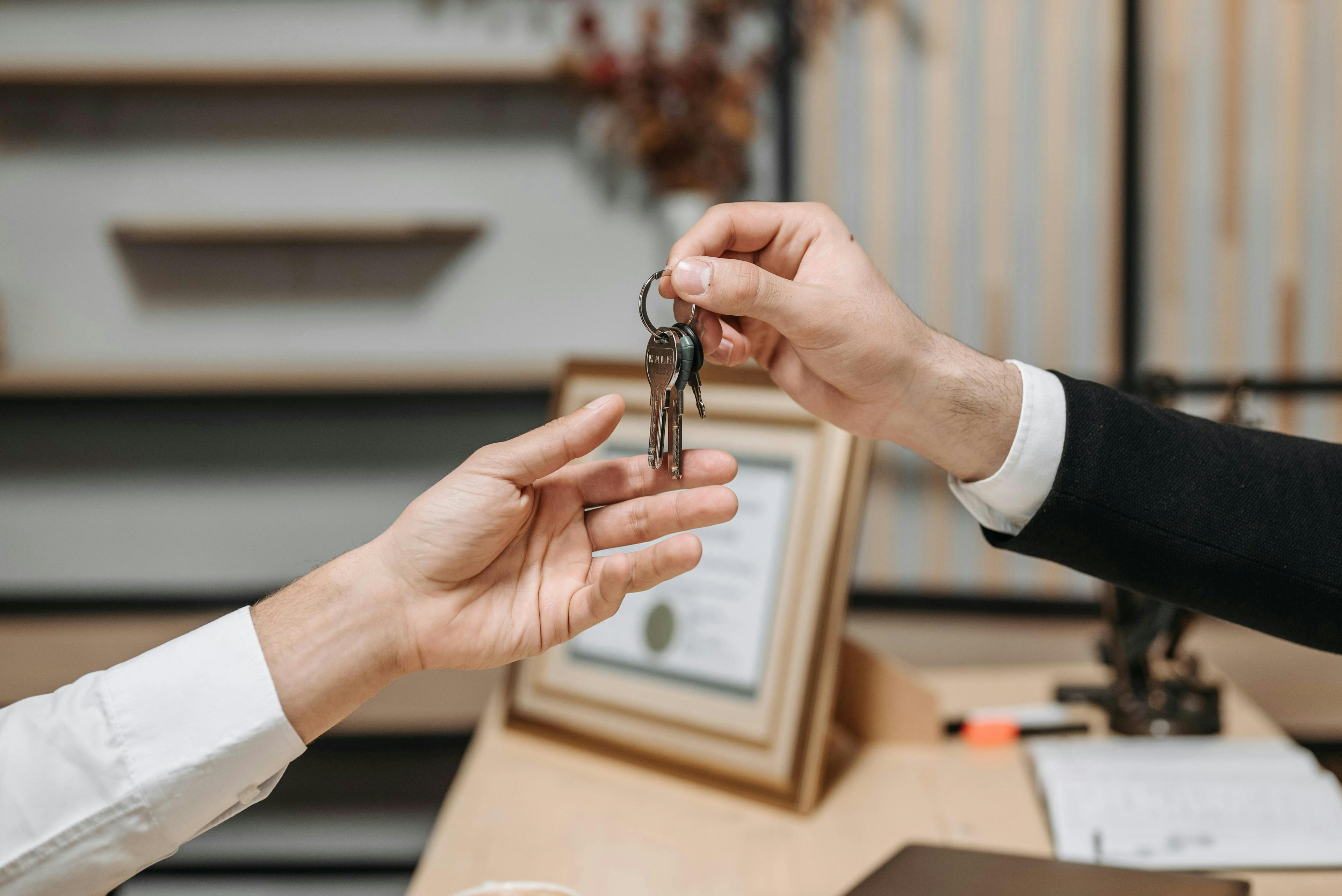 lawyer handing keys to a client