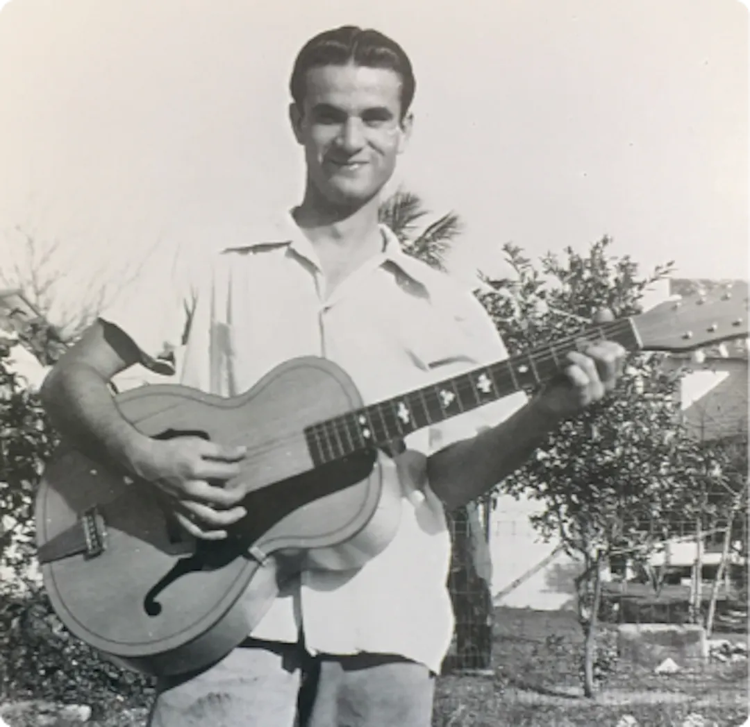 Paul Katsigianis with guitar