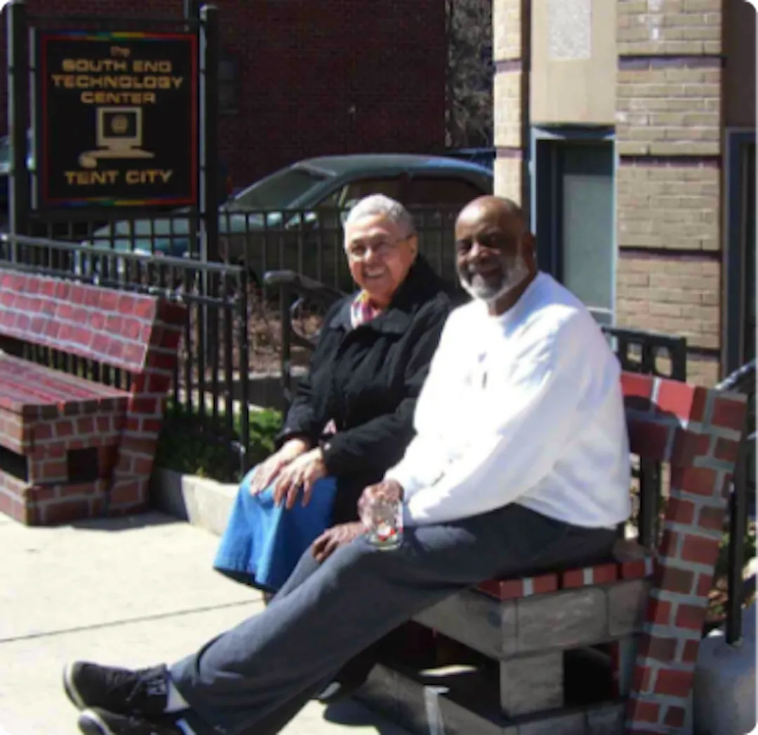 Joyce and Mel King sitting on a bench