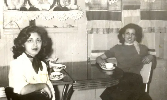 Gloria with her mother Helen in the kitchen of their New York Streets apartment, 1950s.