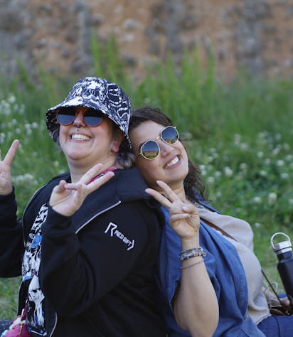Employees posing for a photo smiling
