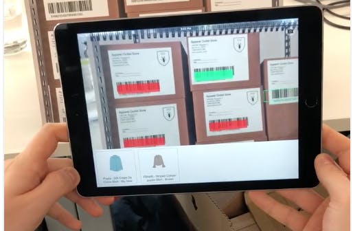 iPad scanning barcodes on clothing boxes