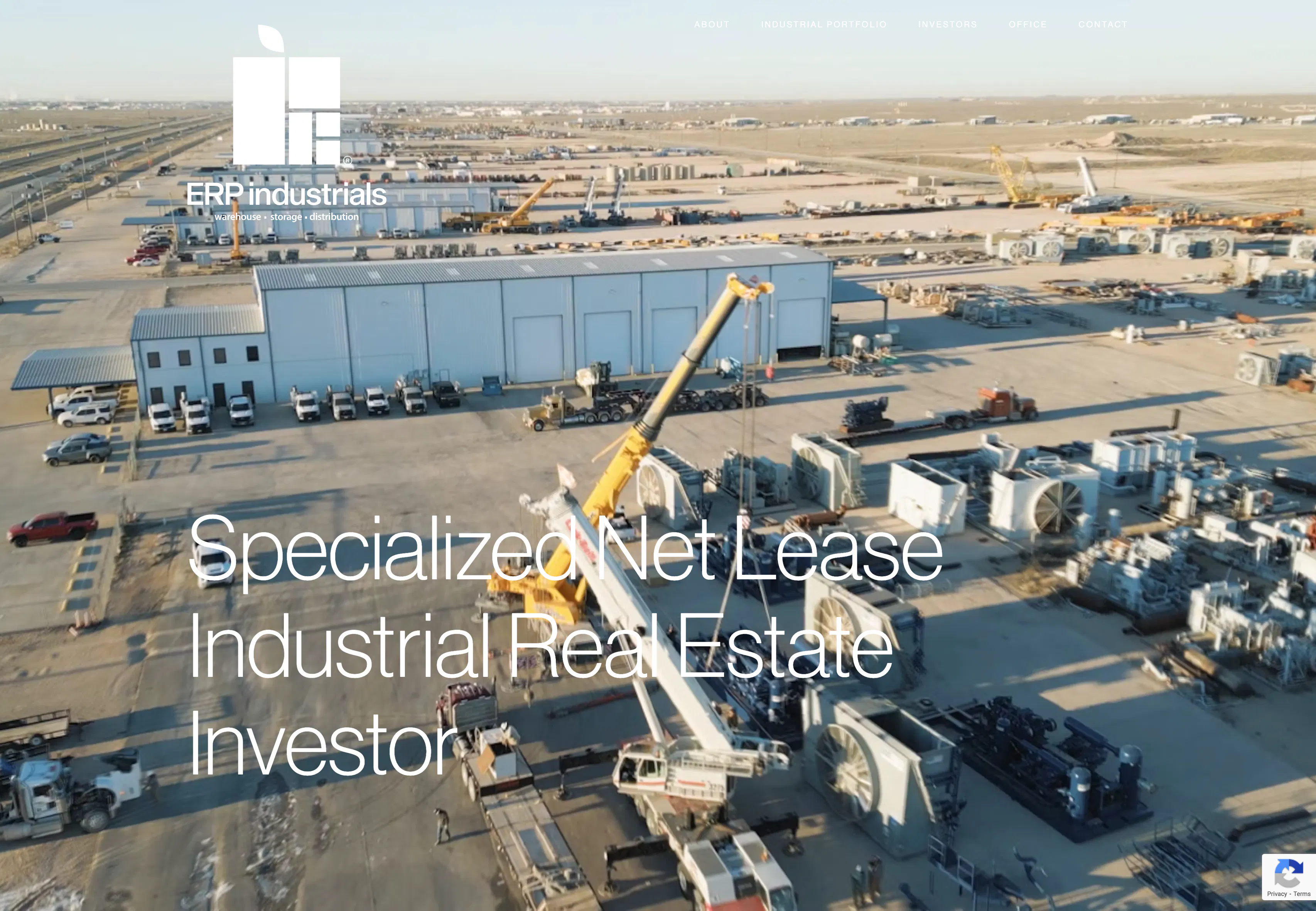 Specialized Net Lease Industrial Real Estate Investor over cranes