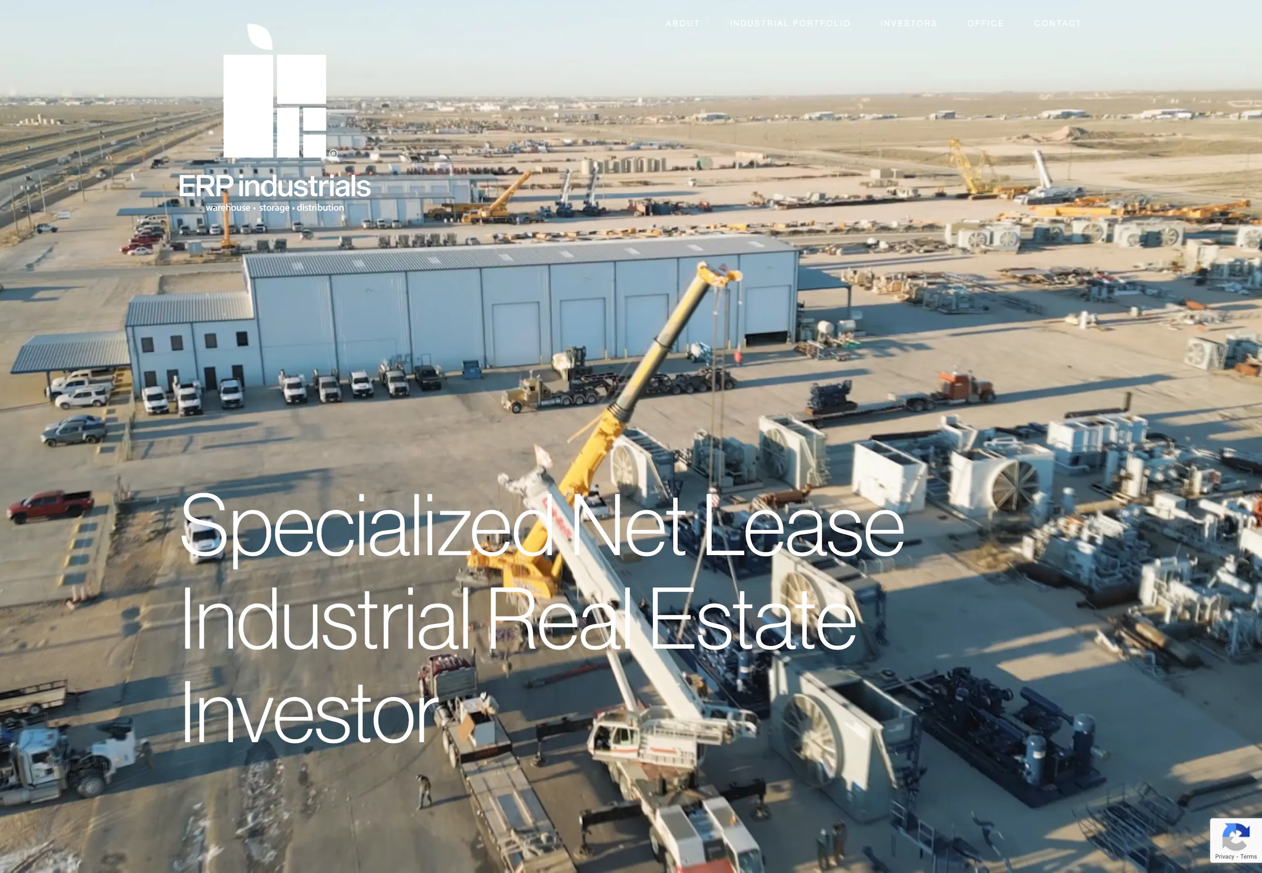 Specialized Net Lease Industrial Real Estate Investor over cranes
