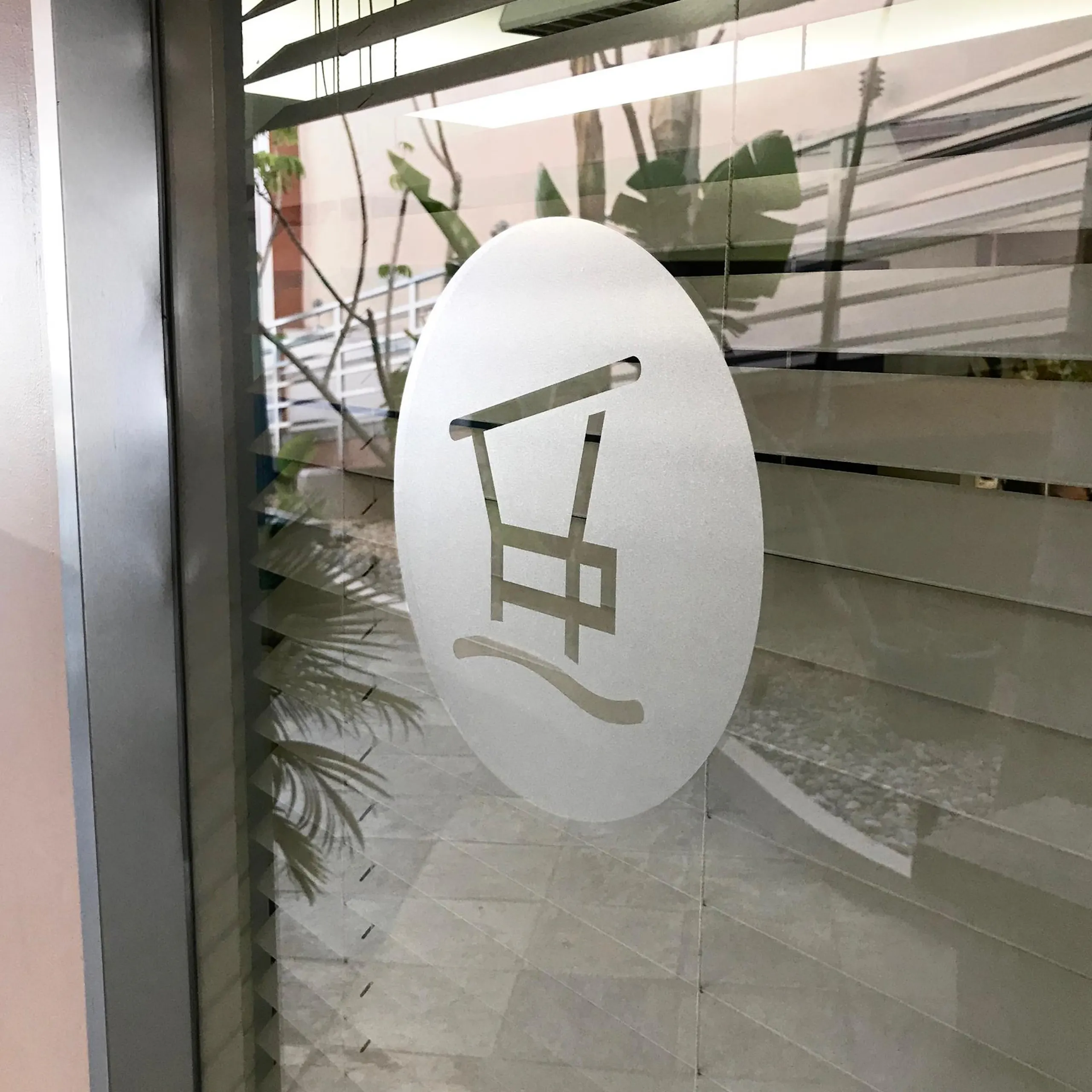 logo glass etching in office