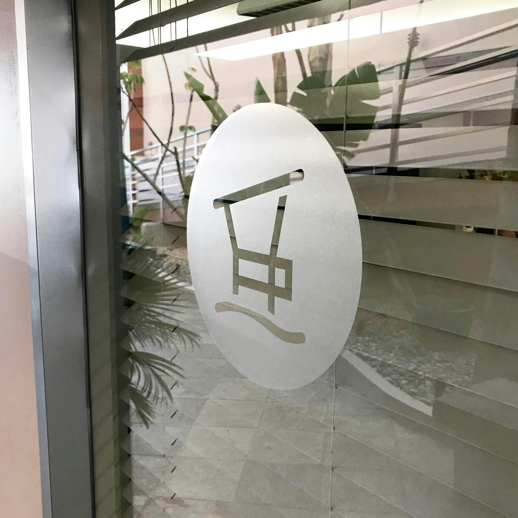 logo glass etching in office