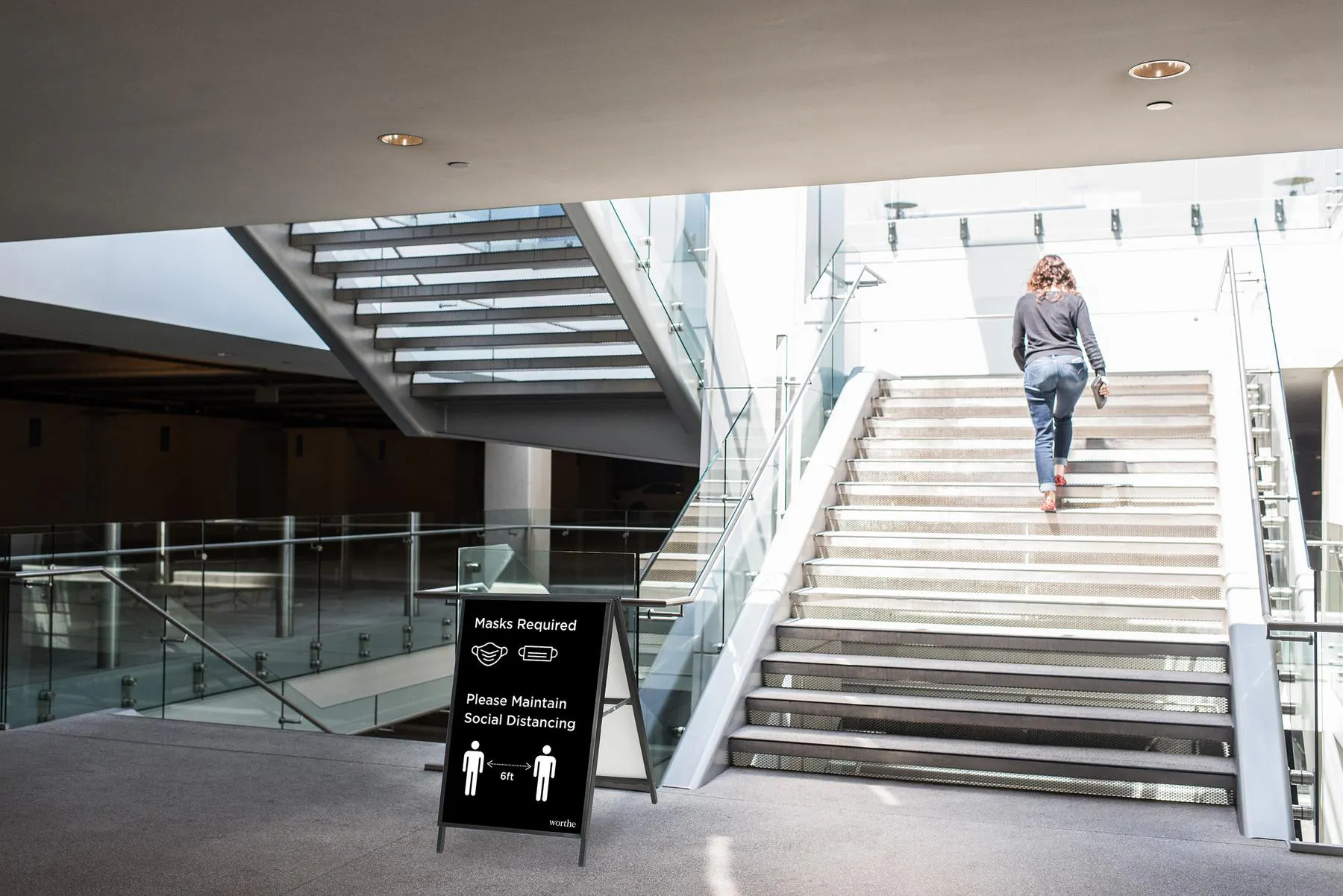 stairwell with covid sign